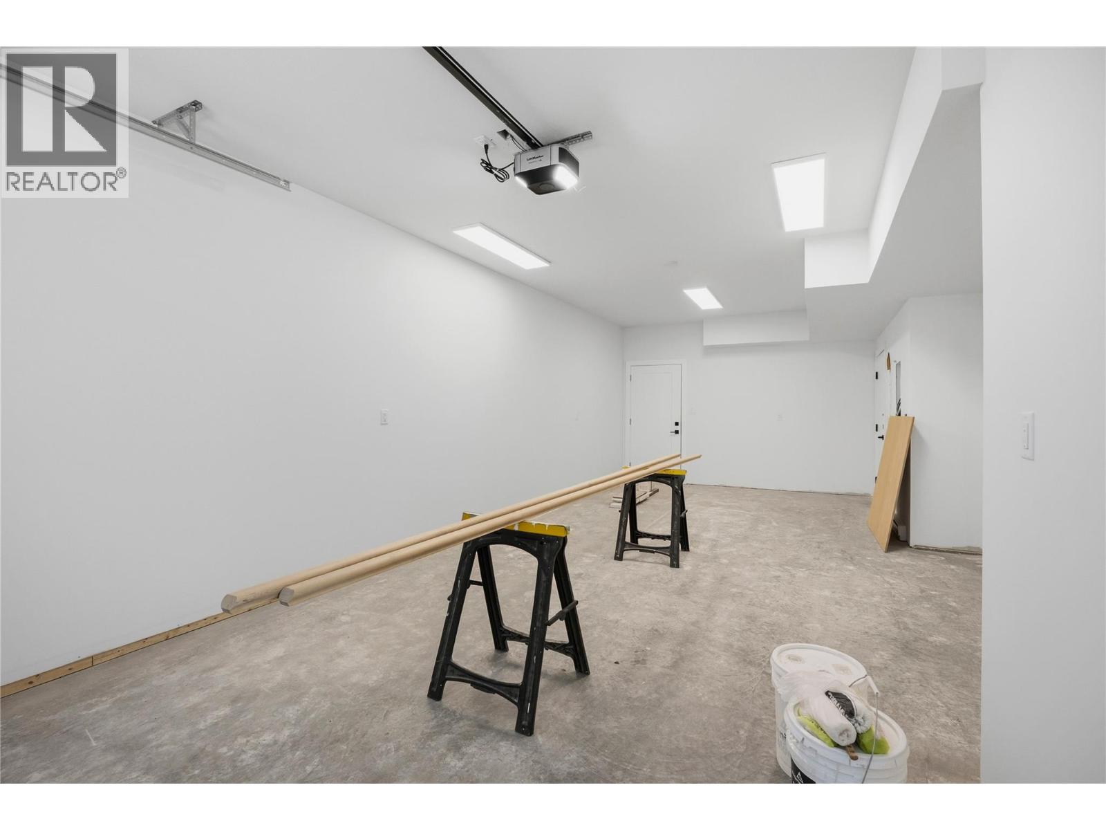 Representative listing media for Unit 101 at 143 Green Avenue, Penticton — single attached garage