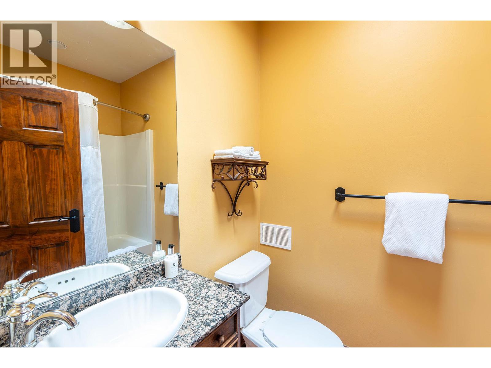 Unit 201 at Casa Grande Inn & Suites, 1070 Lakeshore Drive W, Penticton — full bathroom in the lock-off suite