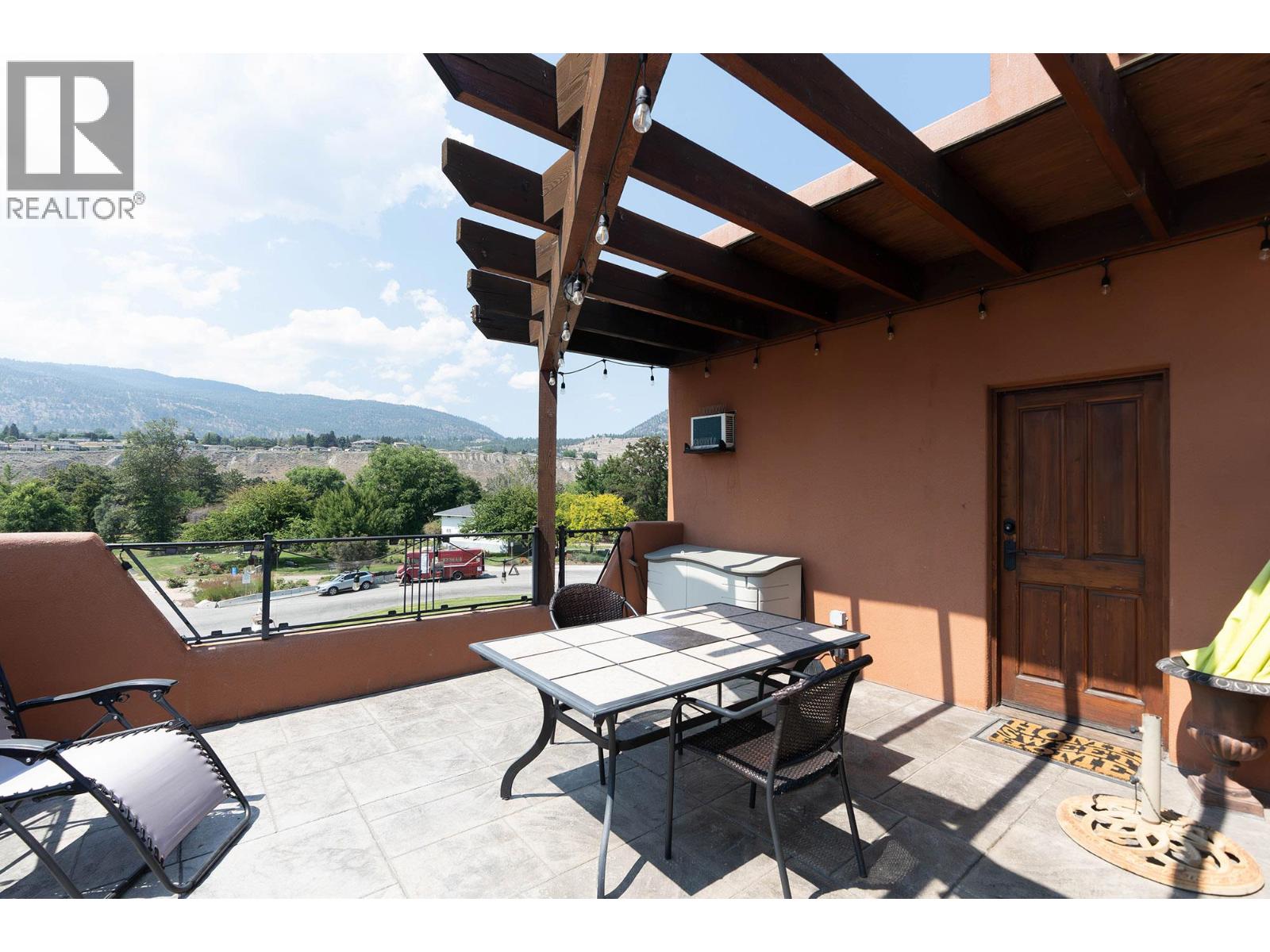 Unit 201 at Casa Grande Inn & Suites, 1070 Lakeshore Drive W, Penticton — balcony with lake outlook