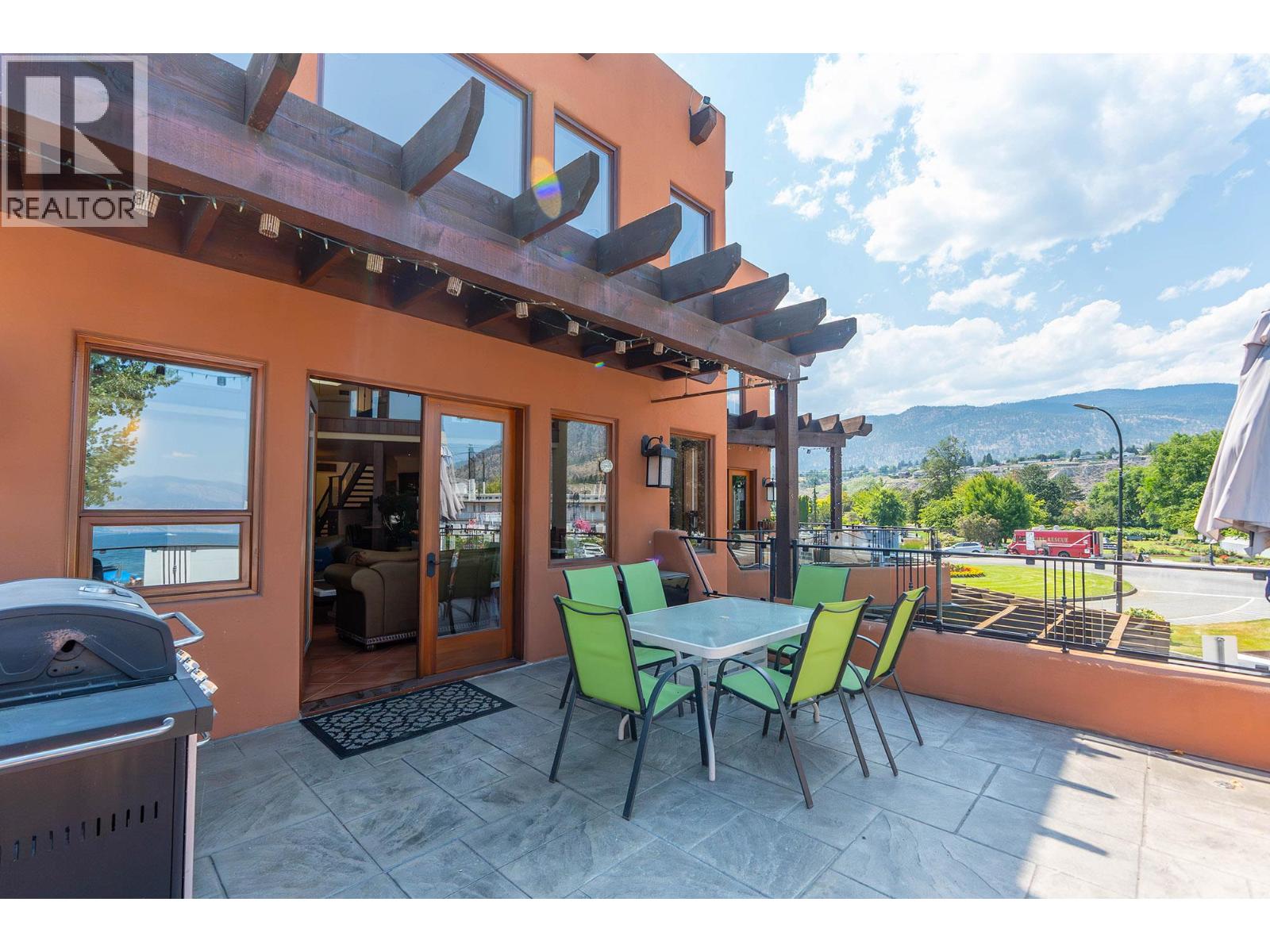 Unit 202 at Casa Grande Inn & Suites, 1070 Lakeshore Drive W, Penticton — private outdoor patio