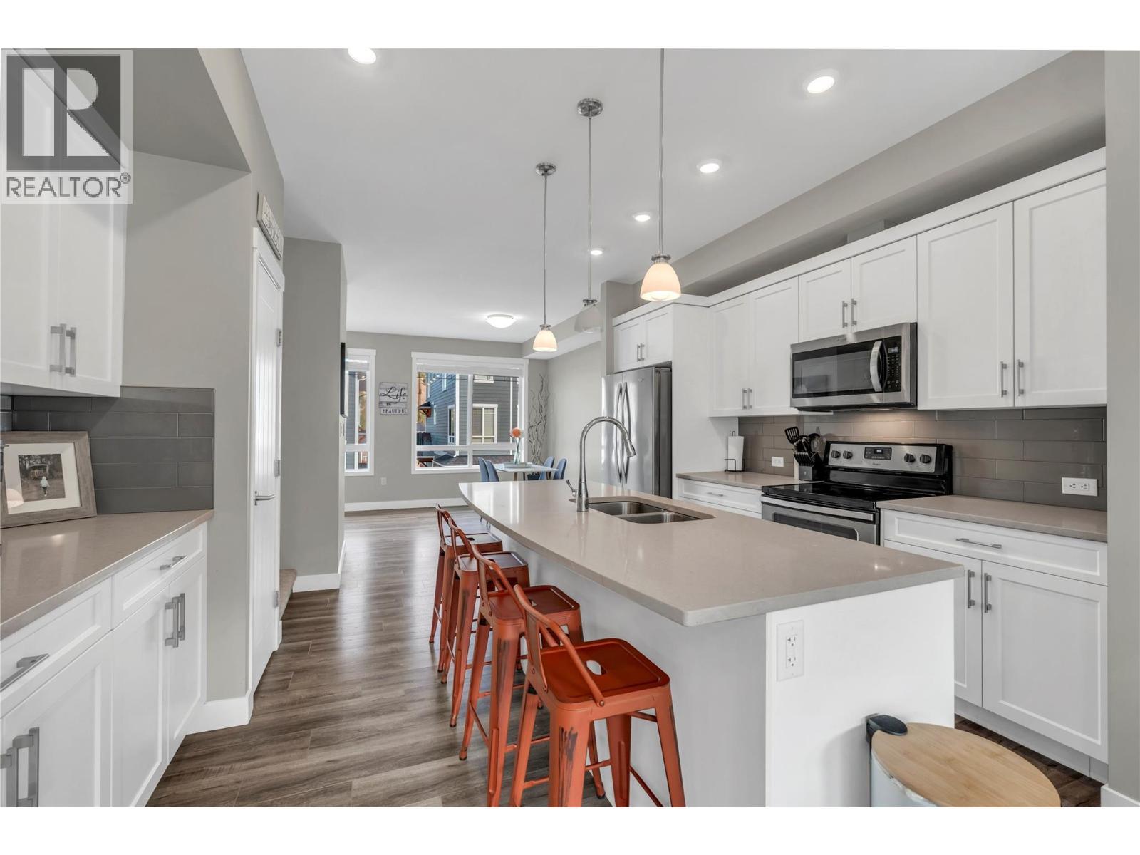 Unit 126 at Sendero Gate, 1115 Holden Road, Penticton — kitchen and living level