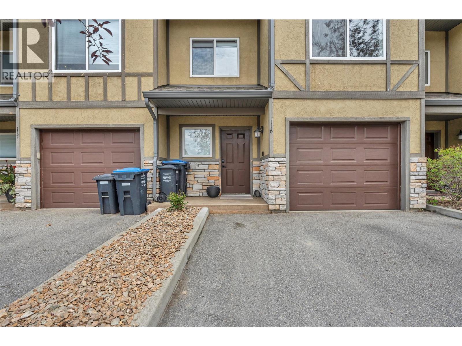 Unit 116 at Somerset Court, 48 Galt Avenue, Penticton — front entrance and attached garage