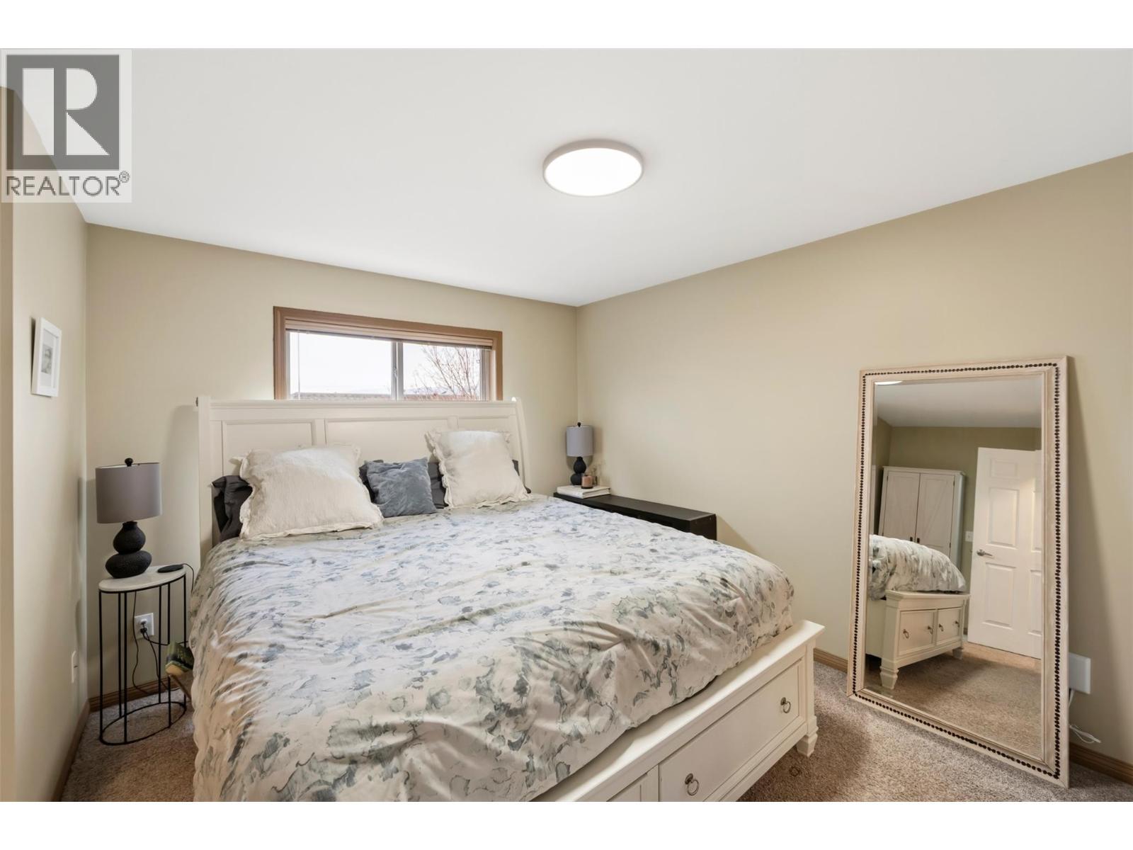 Unit 127 at Somerset Court, 48 Galt Avenue, Penticton — primary bedroom