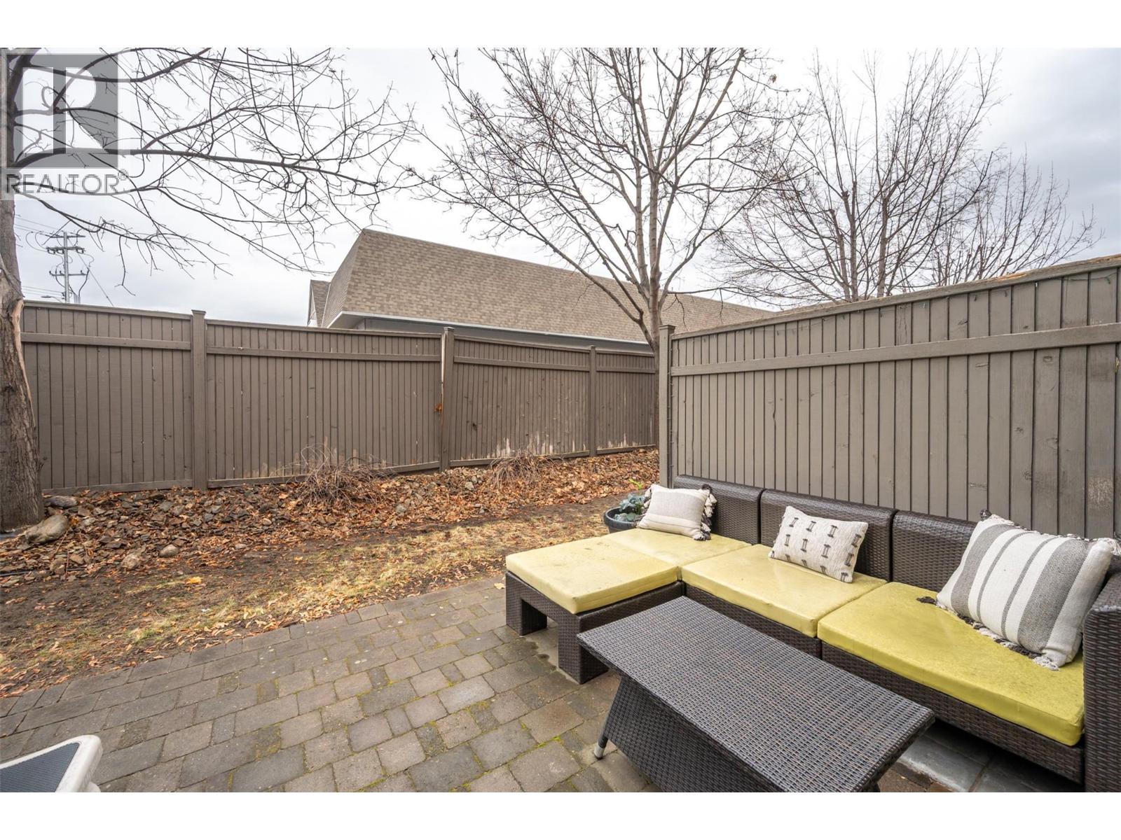 Unit 127 at Somerset Court, 48 Galt Avenue, Penticton — private ground-level patio