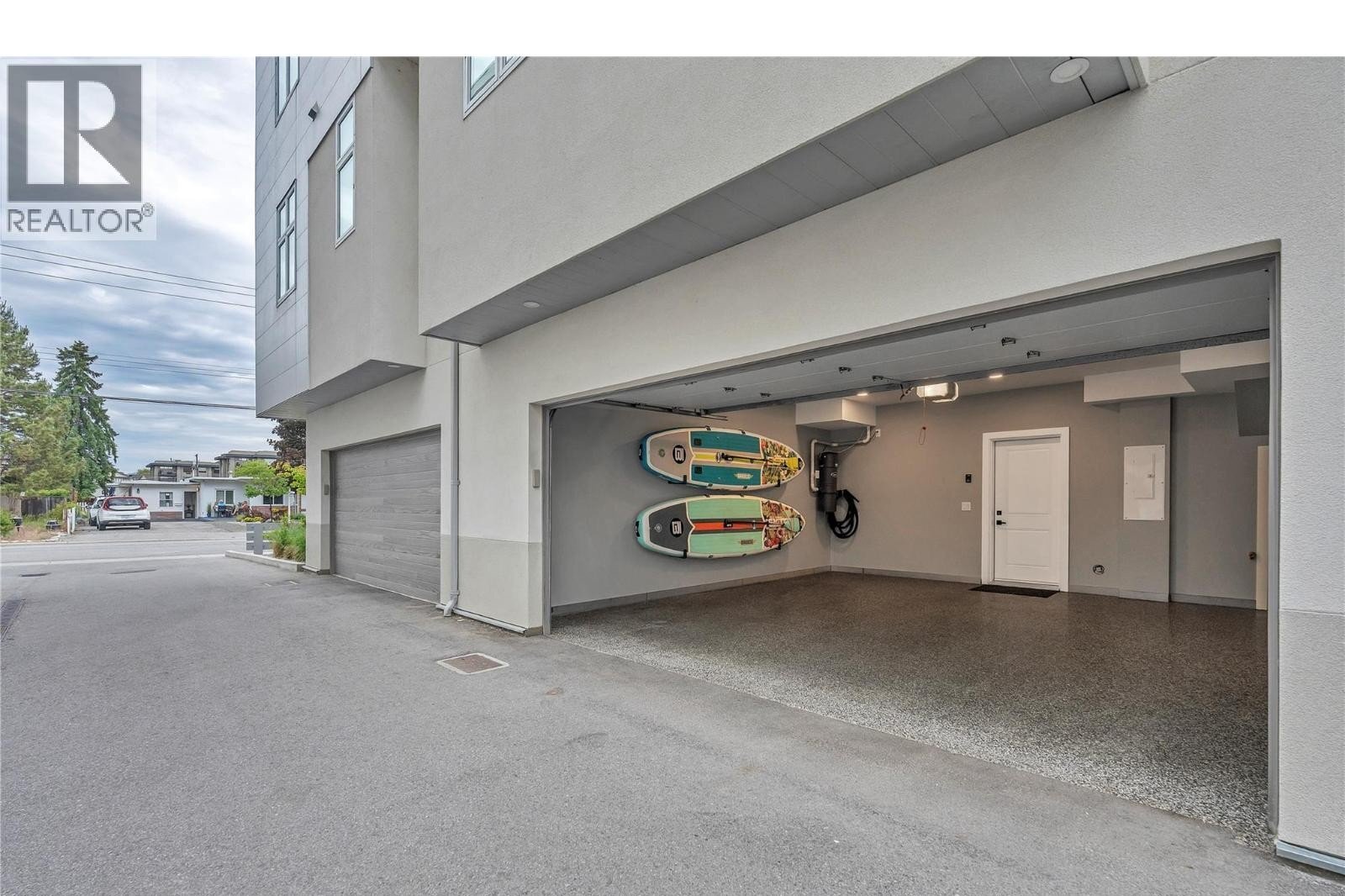 Unit 102 at The Artisan on Lee, 222 Lee Avenue, Penticton — rear garage access