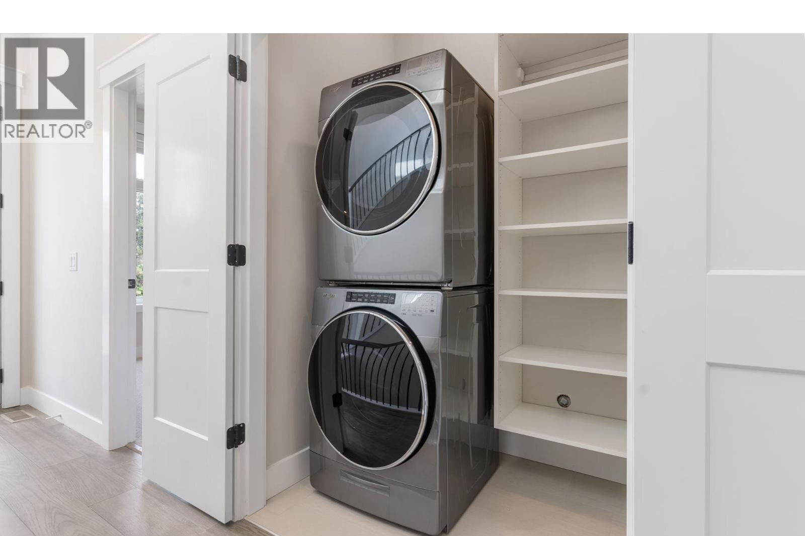 Unit 103 at The Artisan on Lee, 222 Lee Avenue, Penticton — laundry area
