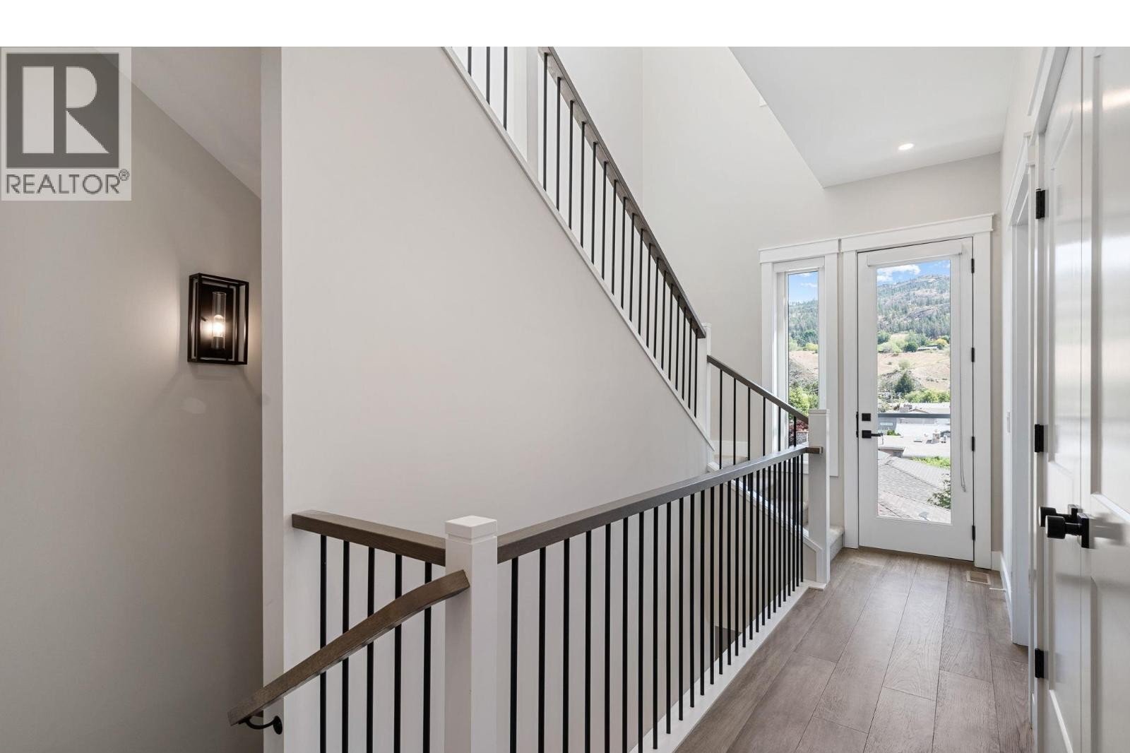Unit 103 at The Artisan on Lee, 222 Lee Avenue, Penticton — stair and landing