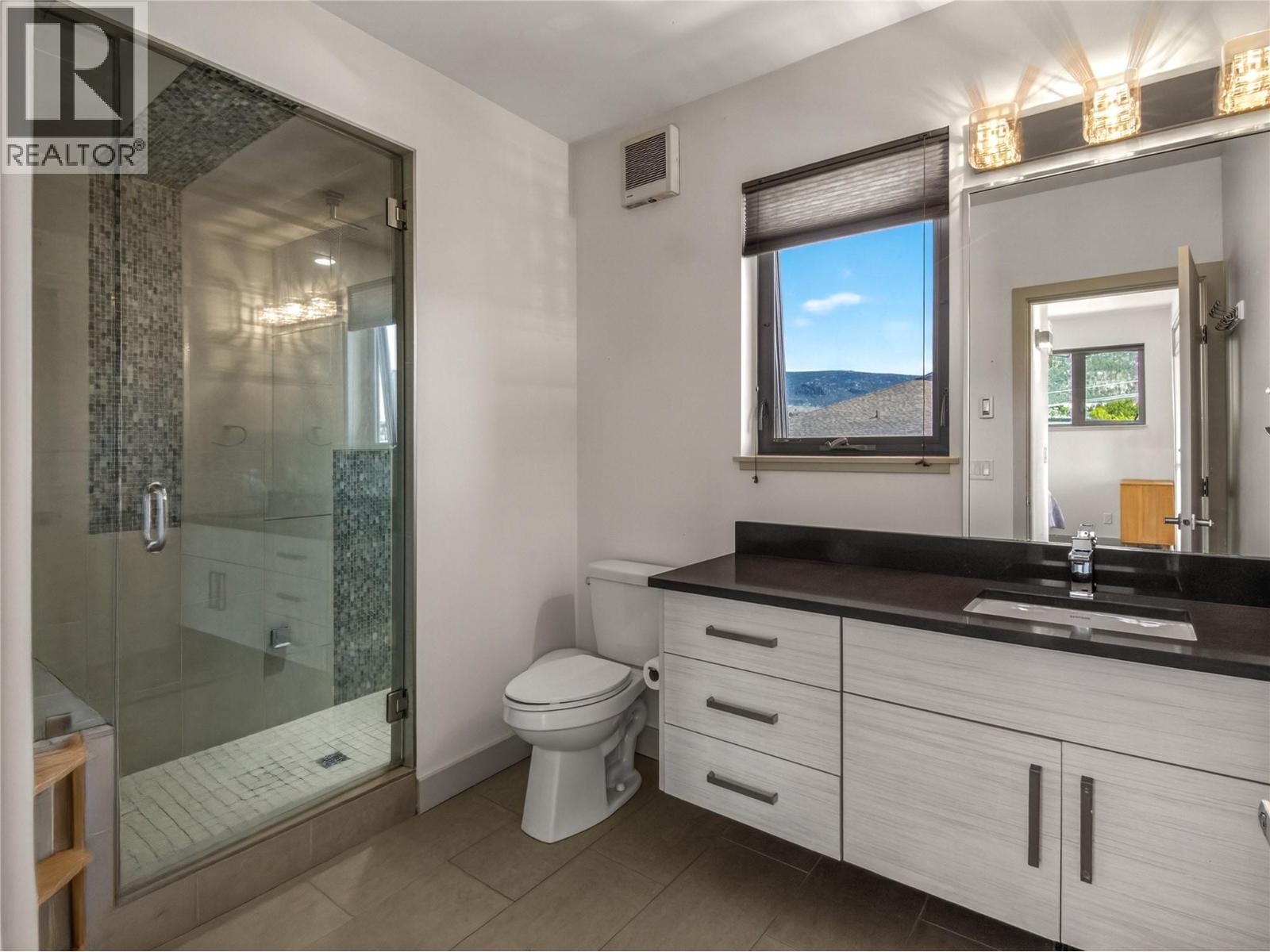 101-433 Churchill Avenue, Penticton — spa-inspired ensuite with glass steam shower