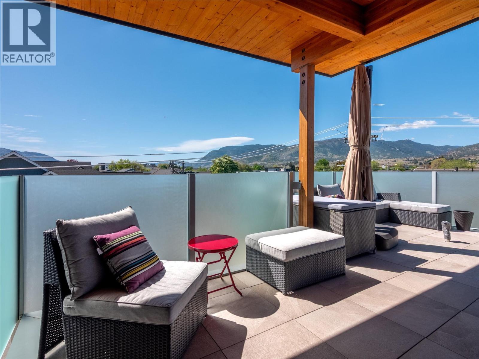 101-433 Churchill Avenue, Penticton — private rooftop patio with lake and mountain views
