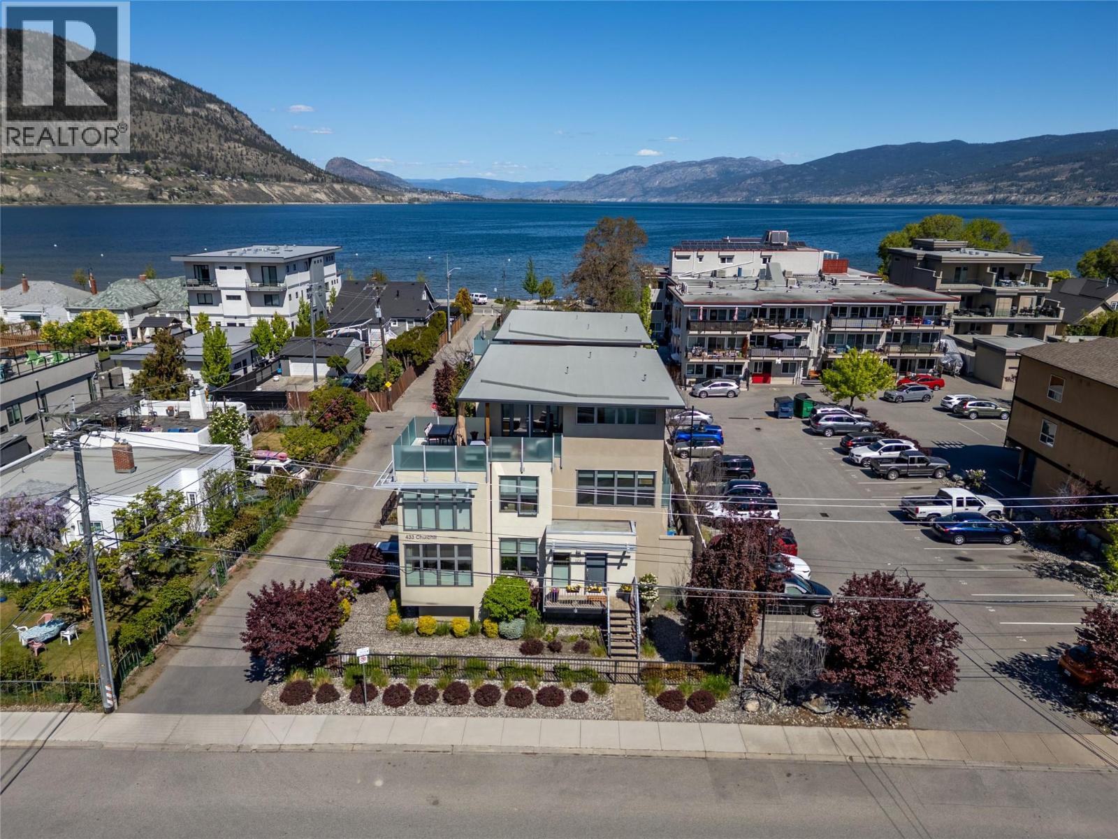 101-433 Churchill Avenue, Penticton — aerial view showing the home near Okanagan Lake
