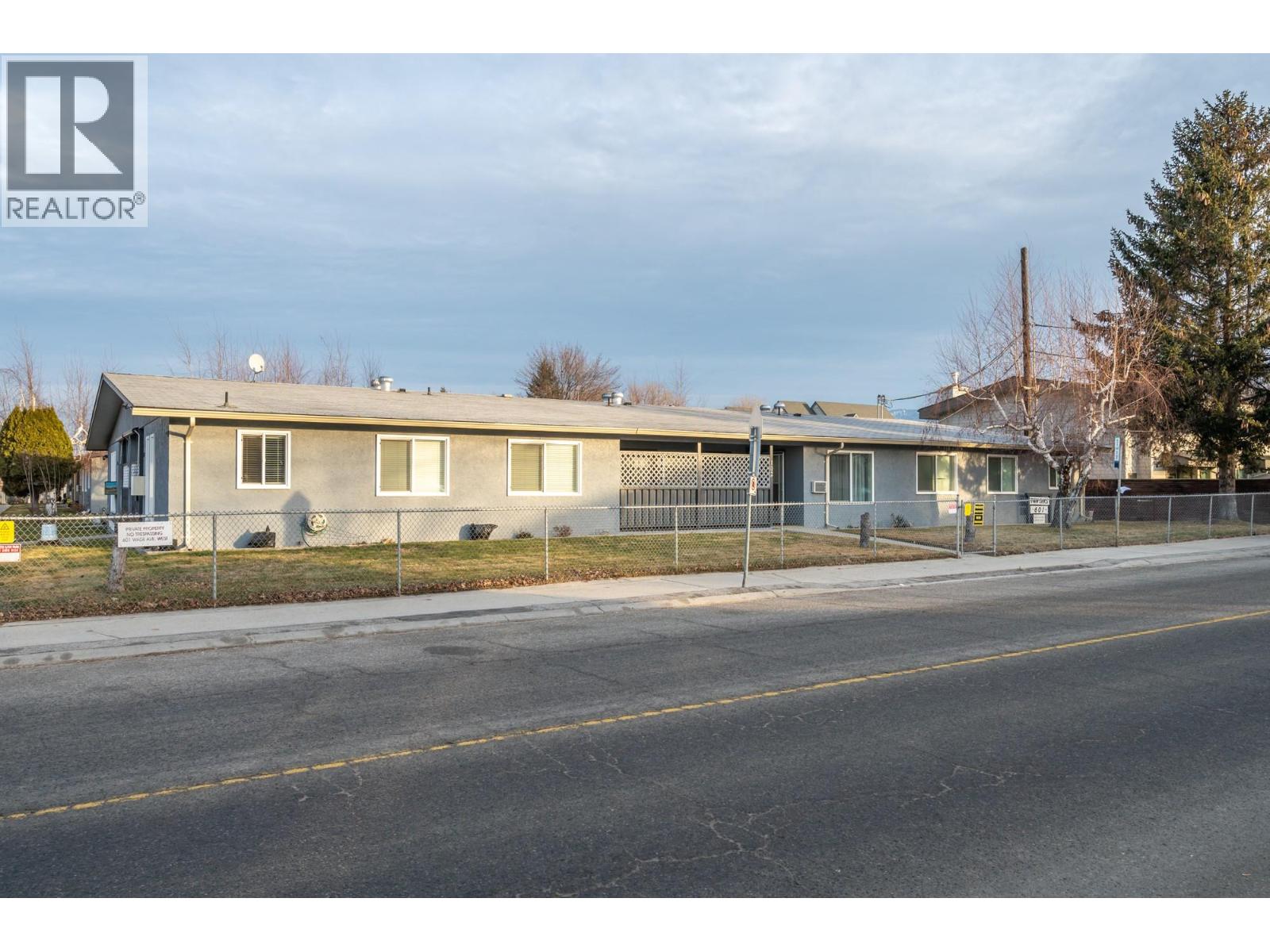 Street-facing view of the 601 Wade Avenue W townhome complex in Penticton