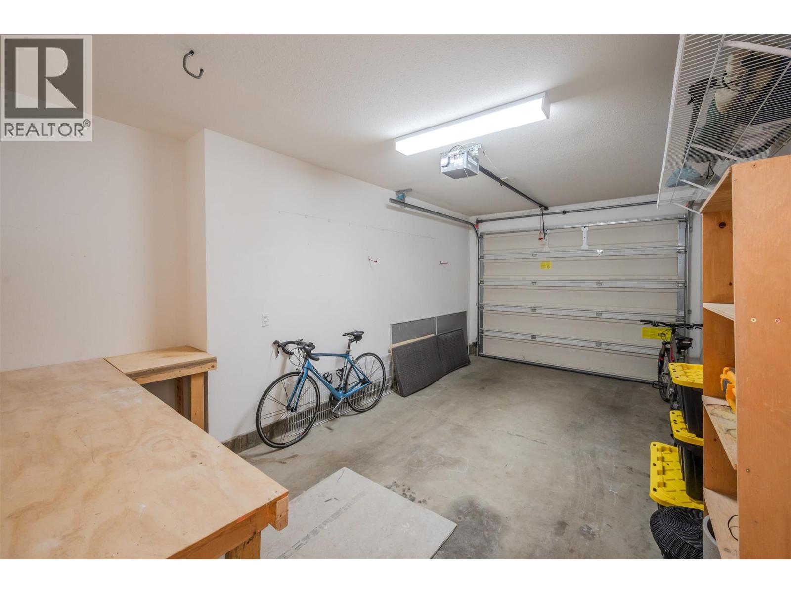 Single garage with storage at Unit 102.