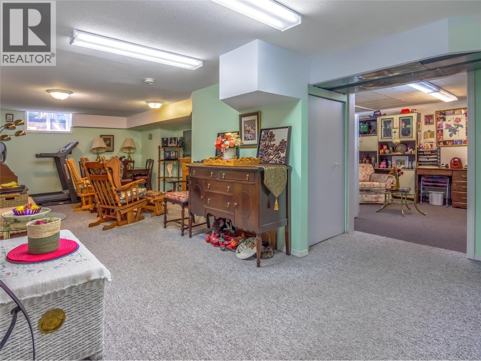 102-2445 South Main Street, Penticton — finished lower-level recreation room