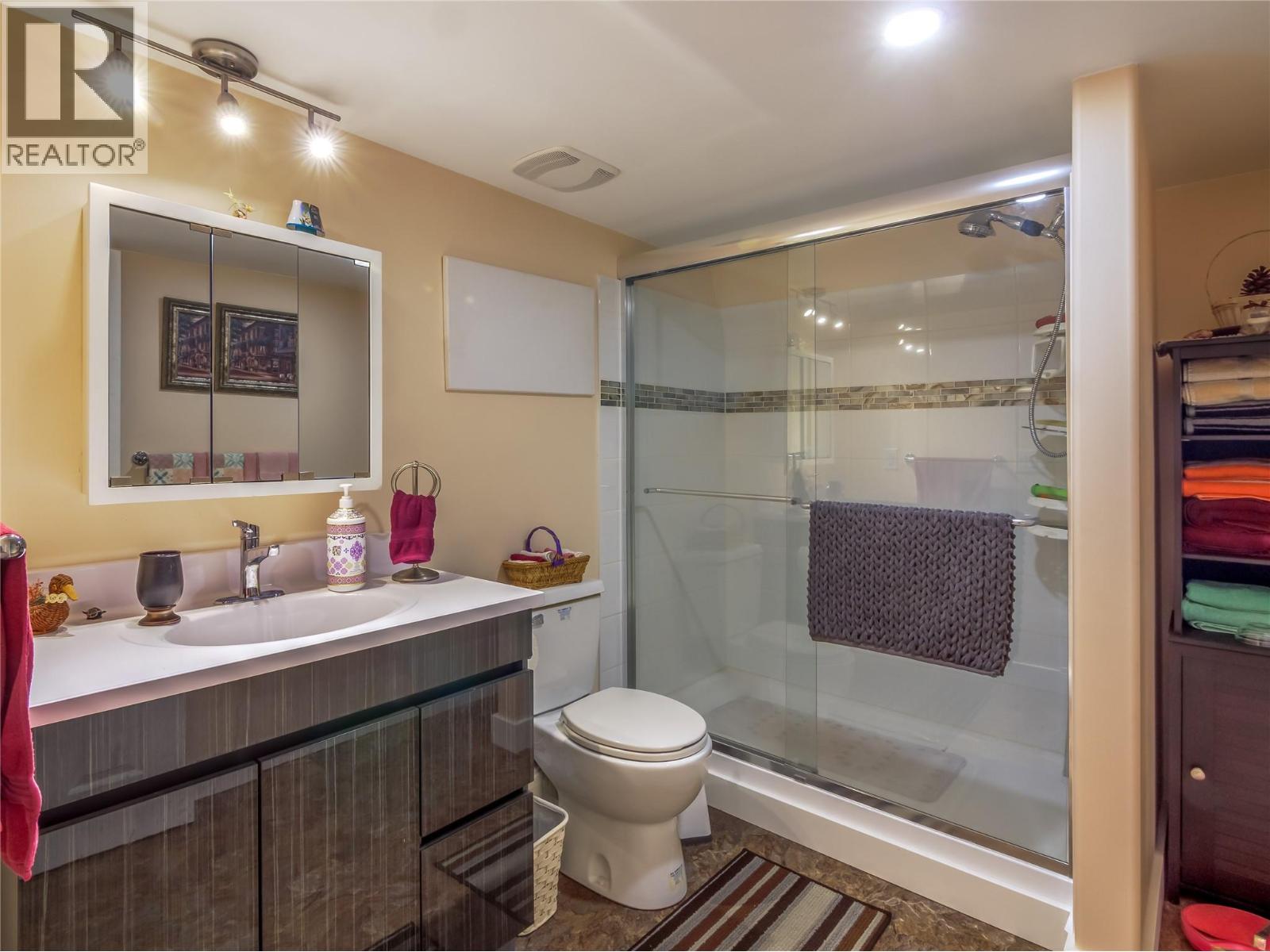 102-2445 South Main Street, Penticton — lower-level bathroom