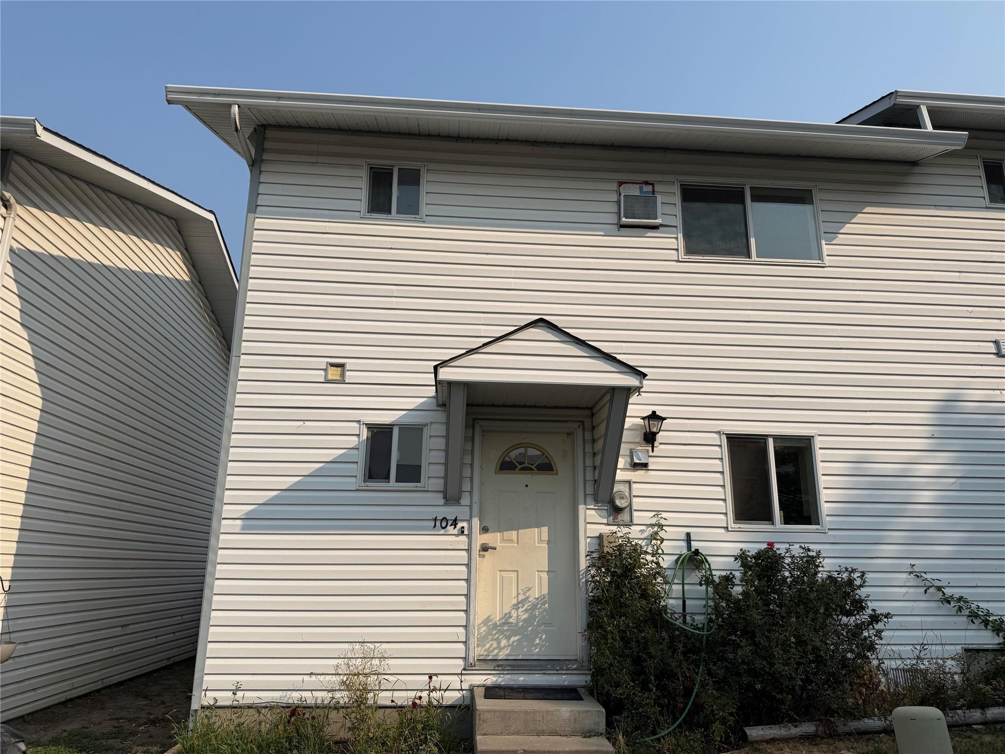 Front exterior of the corner townhome at 104-3004 South Main Street in Penticton.
