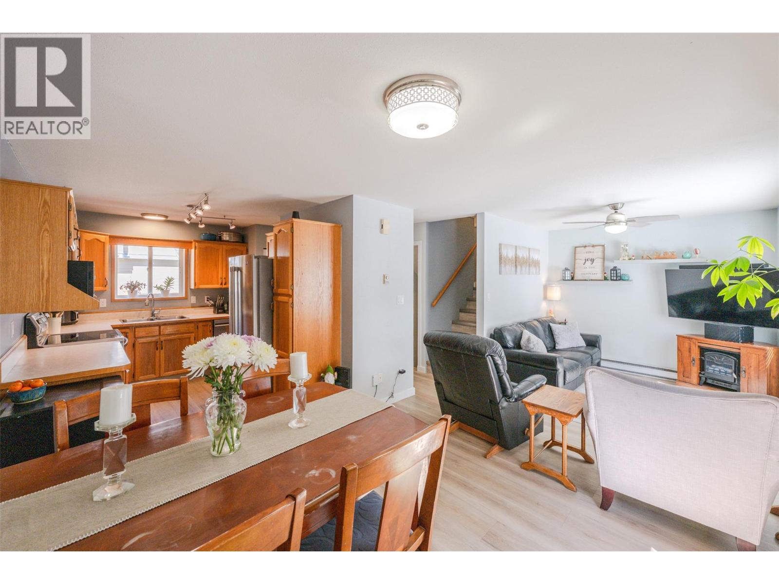 108 3372 South Main Street, Penticton — open kitchen and living area