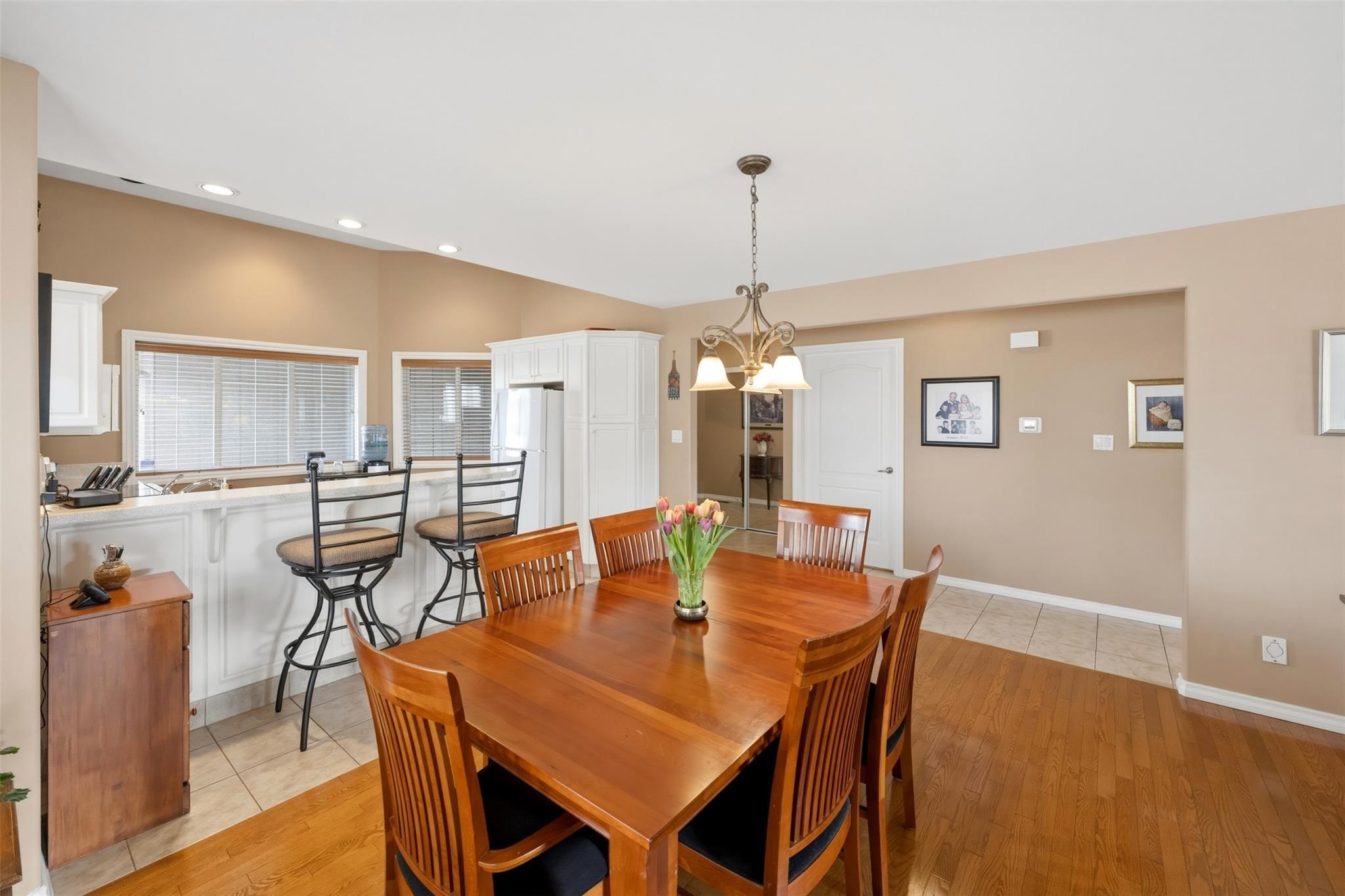 108-705 Balsam Avenue, Penticton — dining room and open kitchen