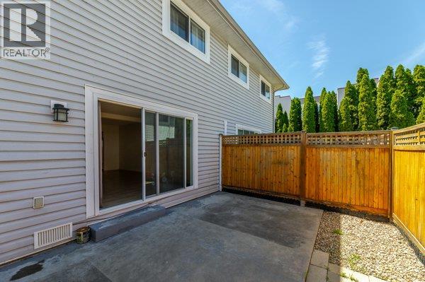 113 3315 Wilson Street, Penticton — rear exterior and patio access
