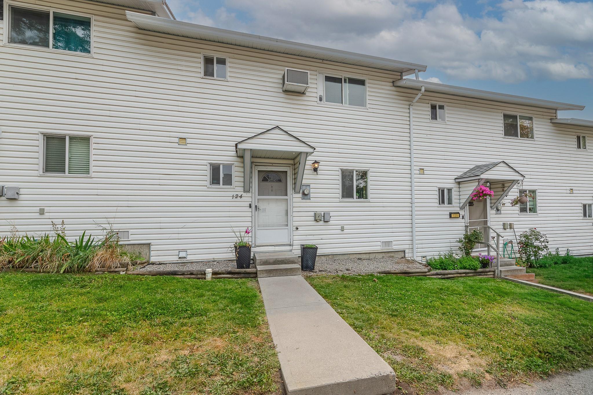 Front exterior and entrance of Unit 124 at 3004 South Main Street in Penticton.