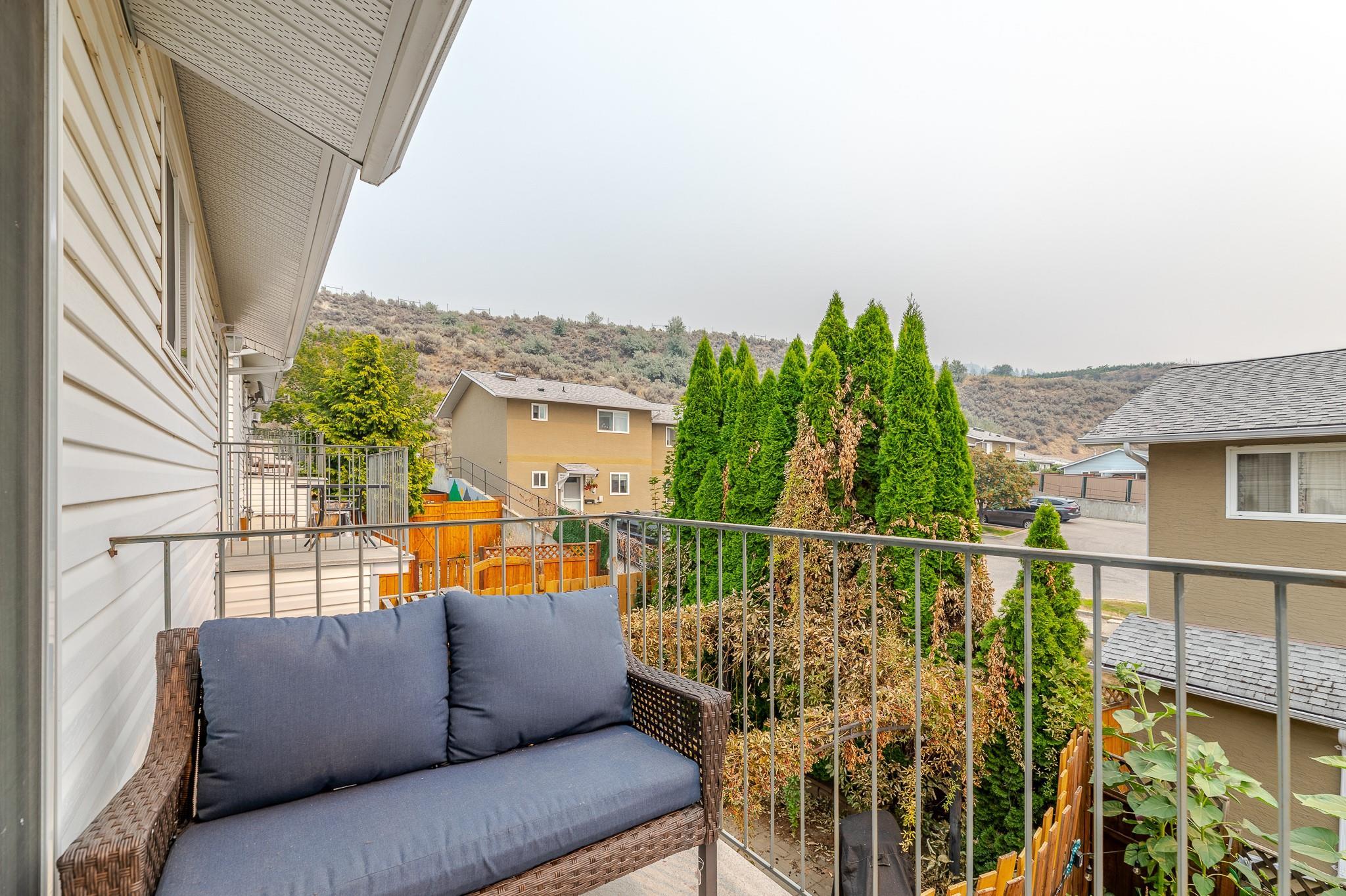 Upper balcony and neighbourhood outlook from Unit 124.
