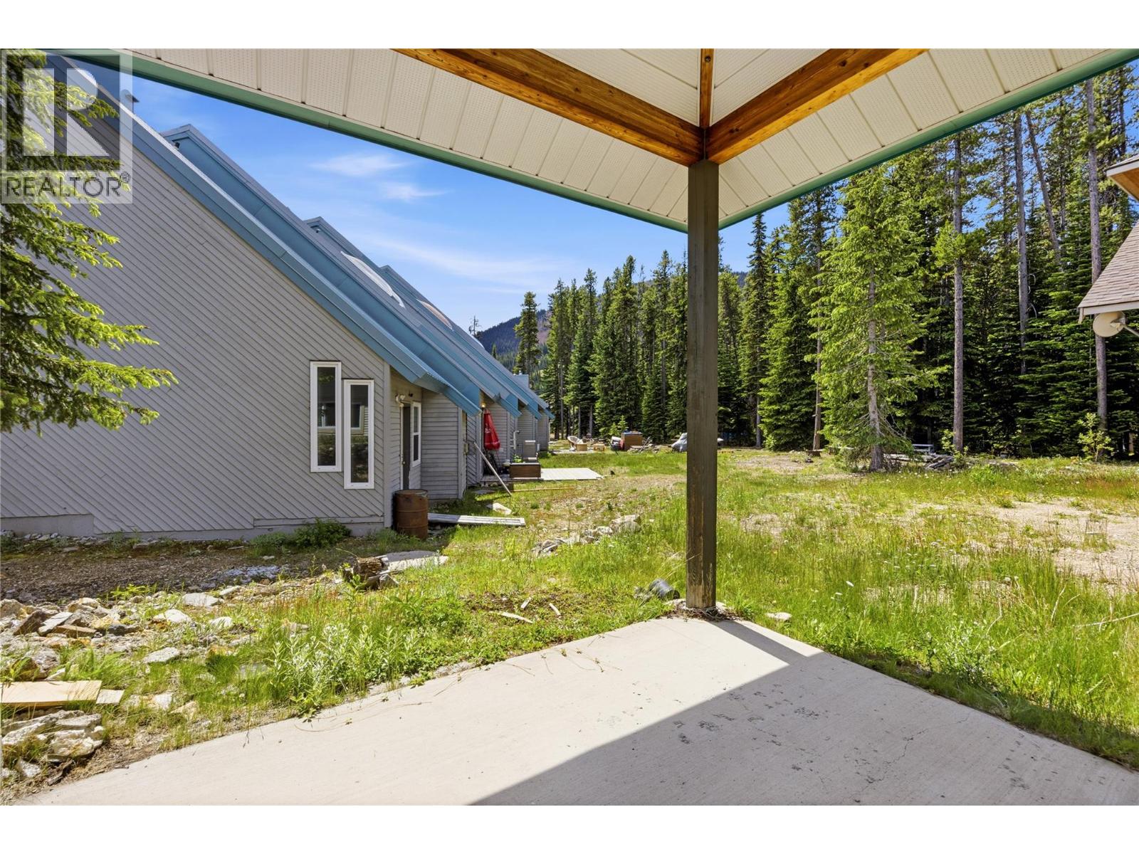 156 Clearview Road Unit 103A — covered patio and wooded setting
