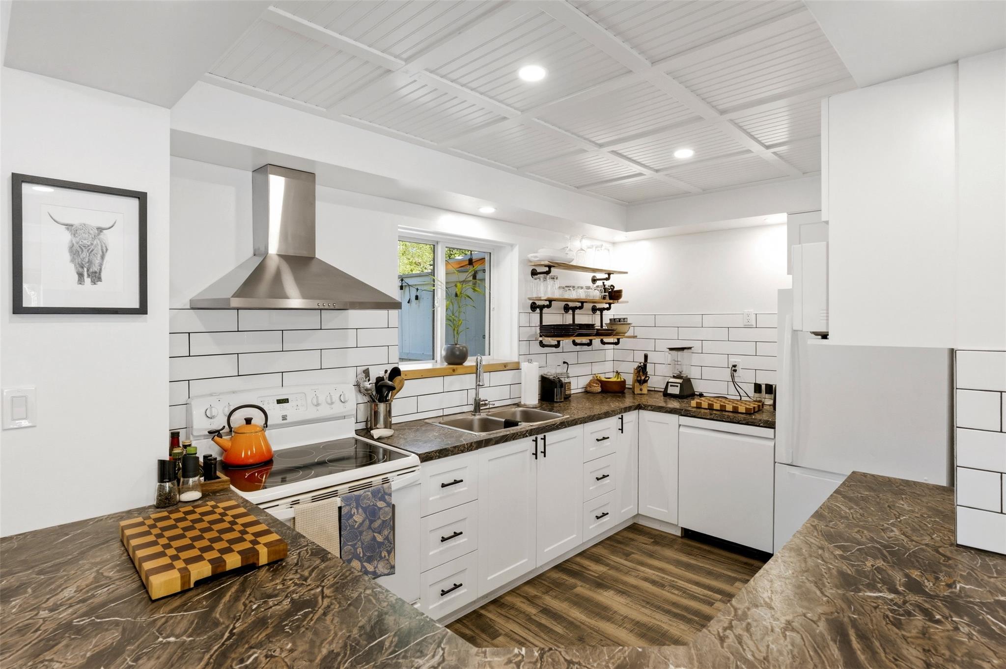 Updated white kitchen in Unit 189 at Cascade Gardens.