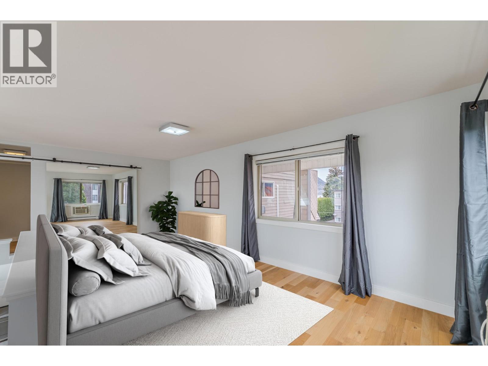 201 335 Churchill Avenue, Penticton — primary loft bedroom