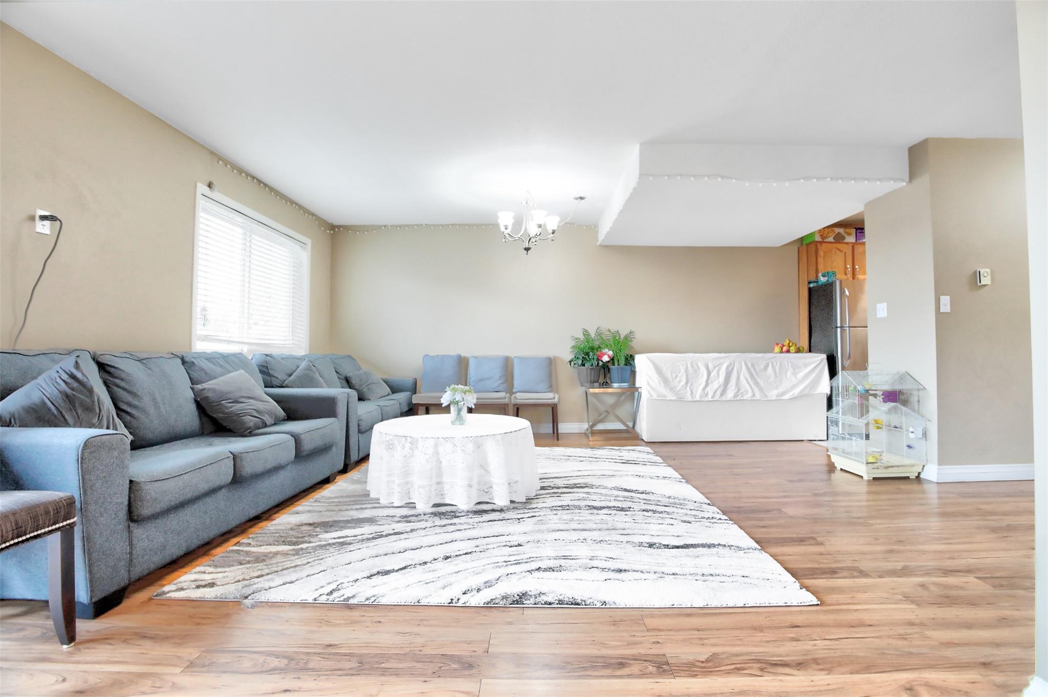 Open main living room in Unit 203 at 95 Eckhardt Avenue East, Penticton.