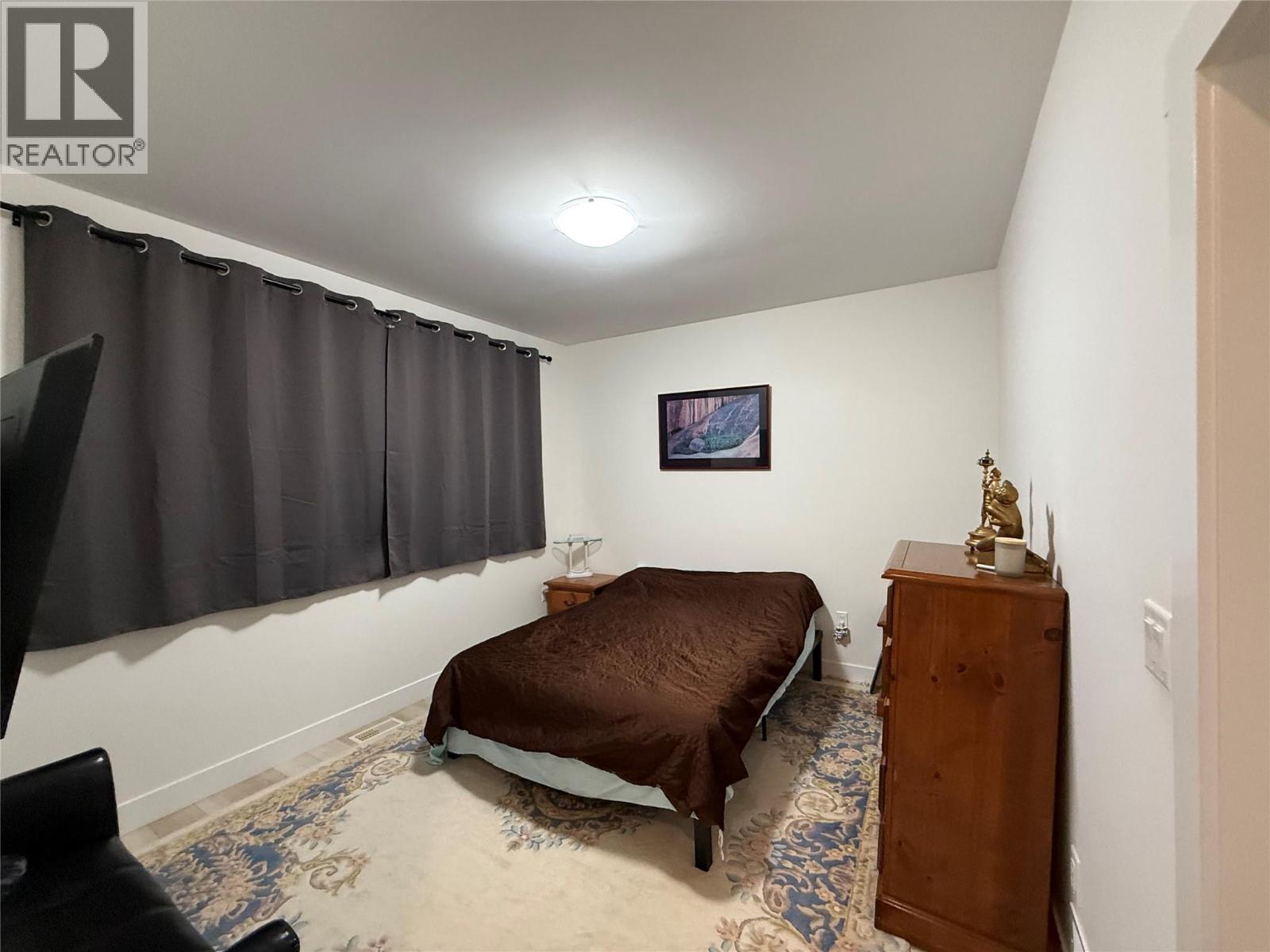 Unit 104 at 210 Scott Avenue, Penticton — secondary bedroom