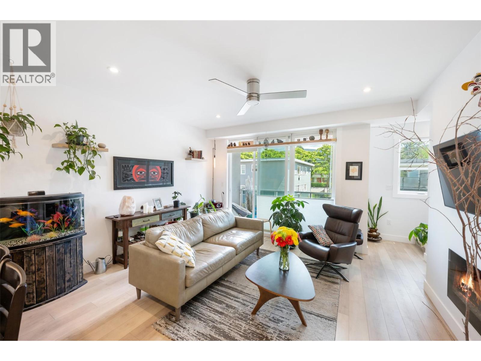 Unit 107 at 210 Scott Avenue, Penticton — bright living room