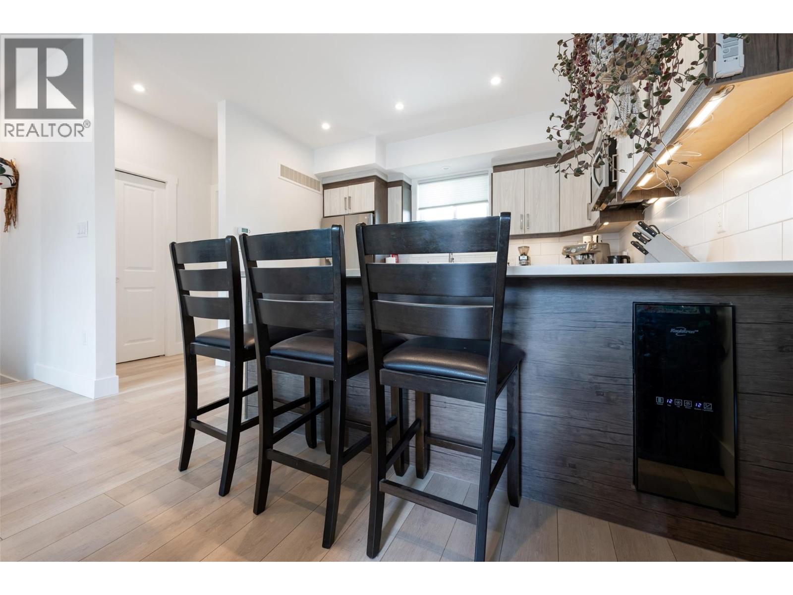 Unit 107 at 210 Scott Avenue, Penticton — dining bar and wine cooler