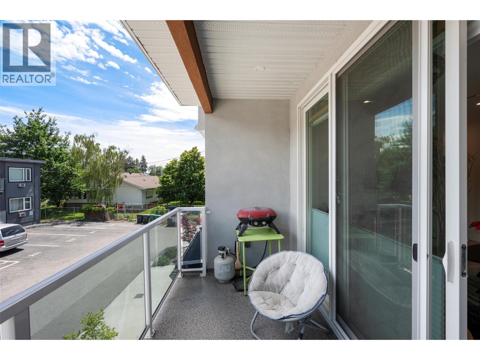 Unit 107 at 210 Scott Avenue, Penticton — covered balcony