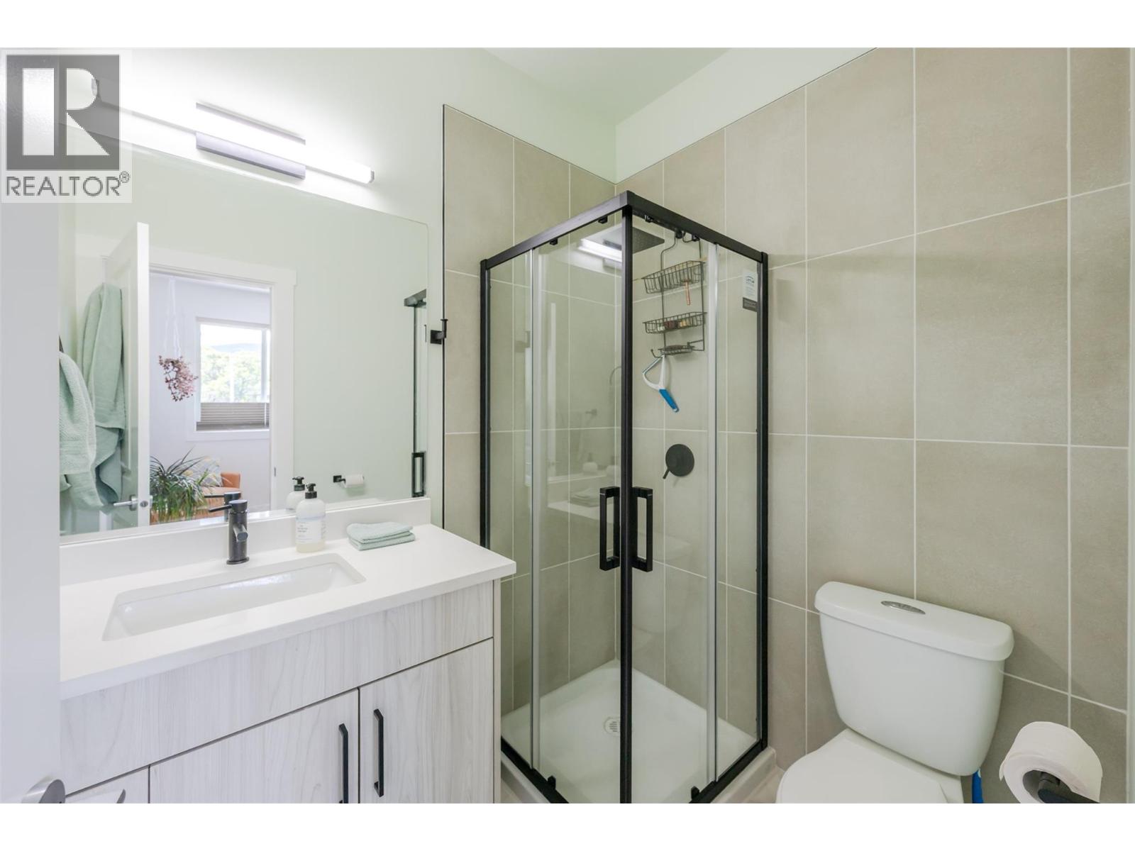 Unit 107 at 210 Scott Avenue, Penticton — renovated ensuite bathroom