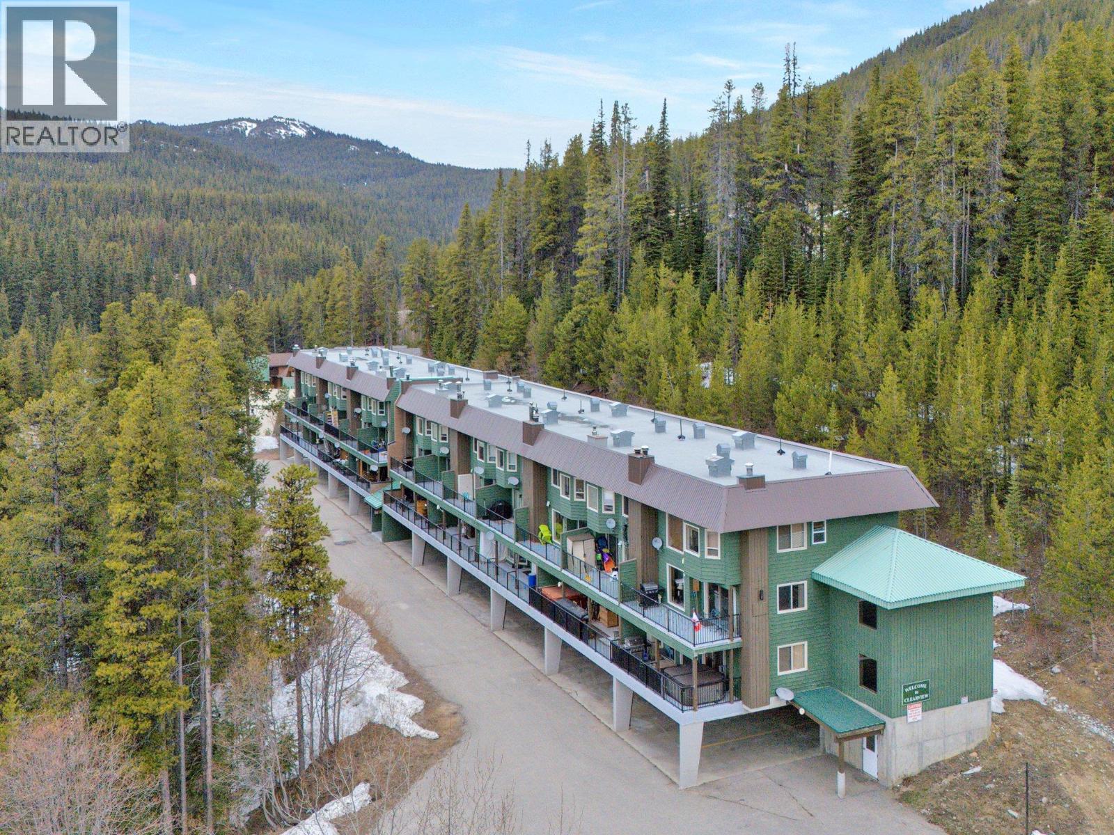 225 Clearview Road Unit 903 — building exterior and forest setting