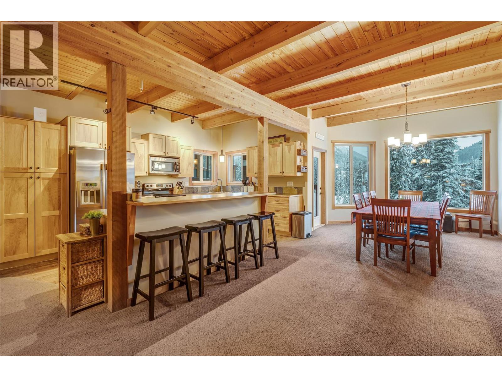 308 Creekview Road Unit 17 — open kitchen, dining and living layout