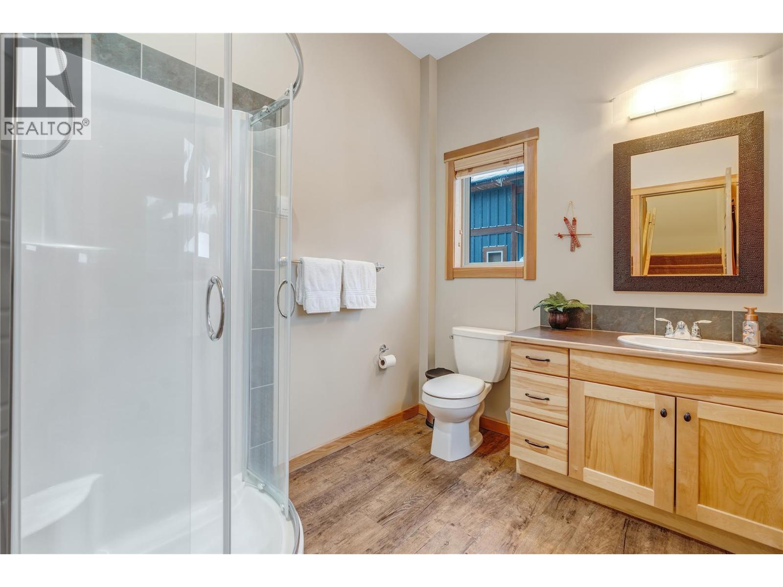 308 Creekview Road Unit 17 — bathroom with glass shower