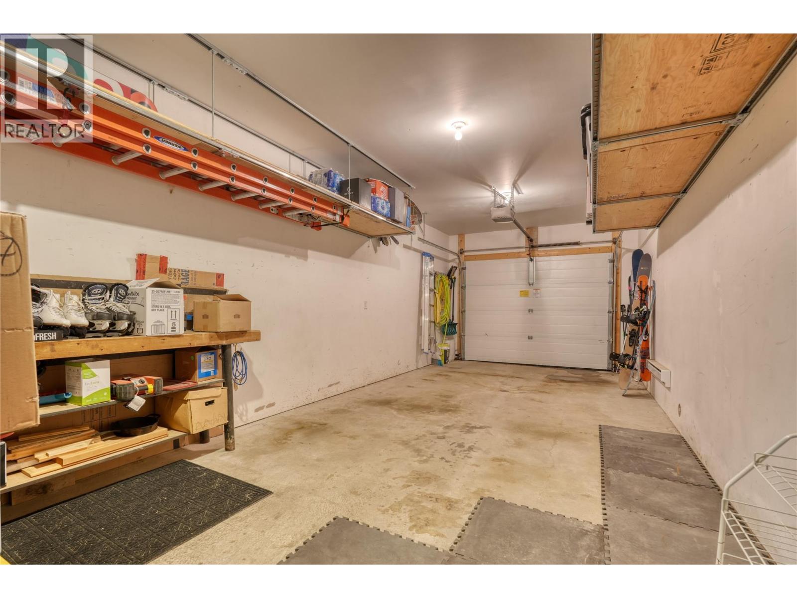 308 Creekview Road Unit 17 — attached garage and gear storage