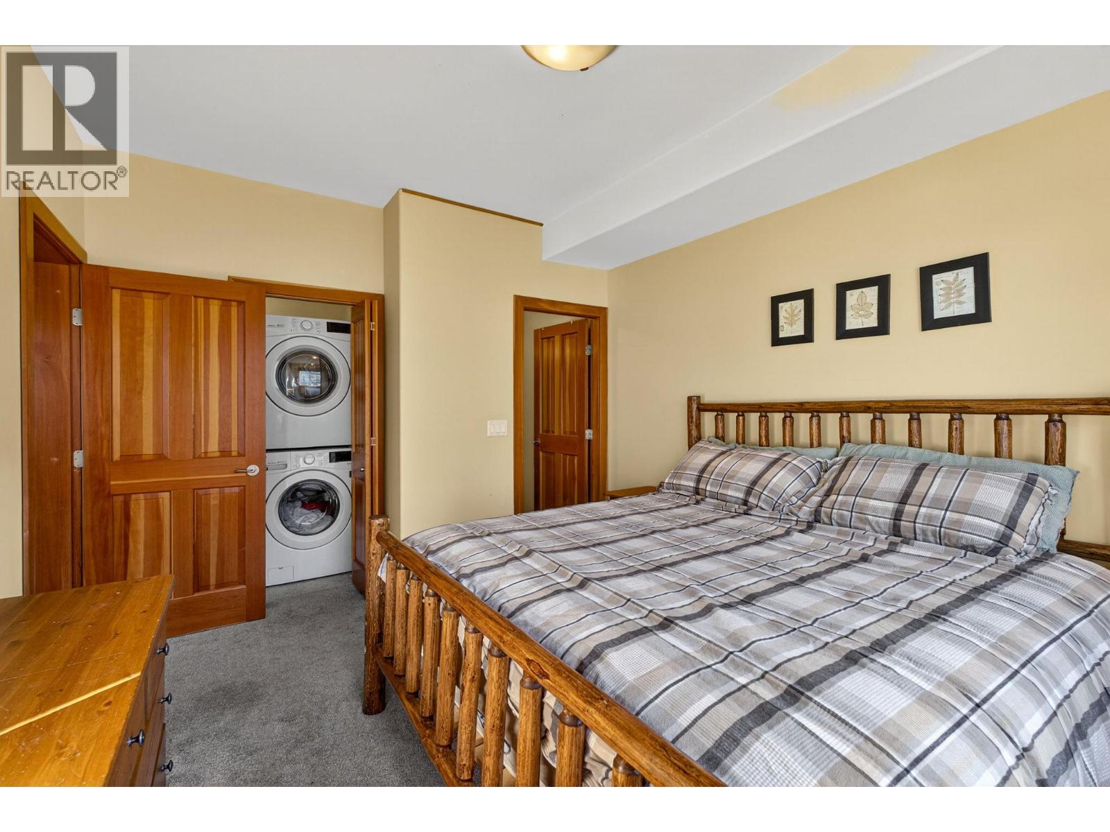 360 Strayhorse Road Unit 19 — primary bedroom and in-suite laundry