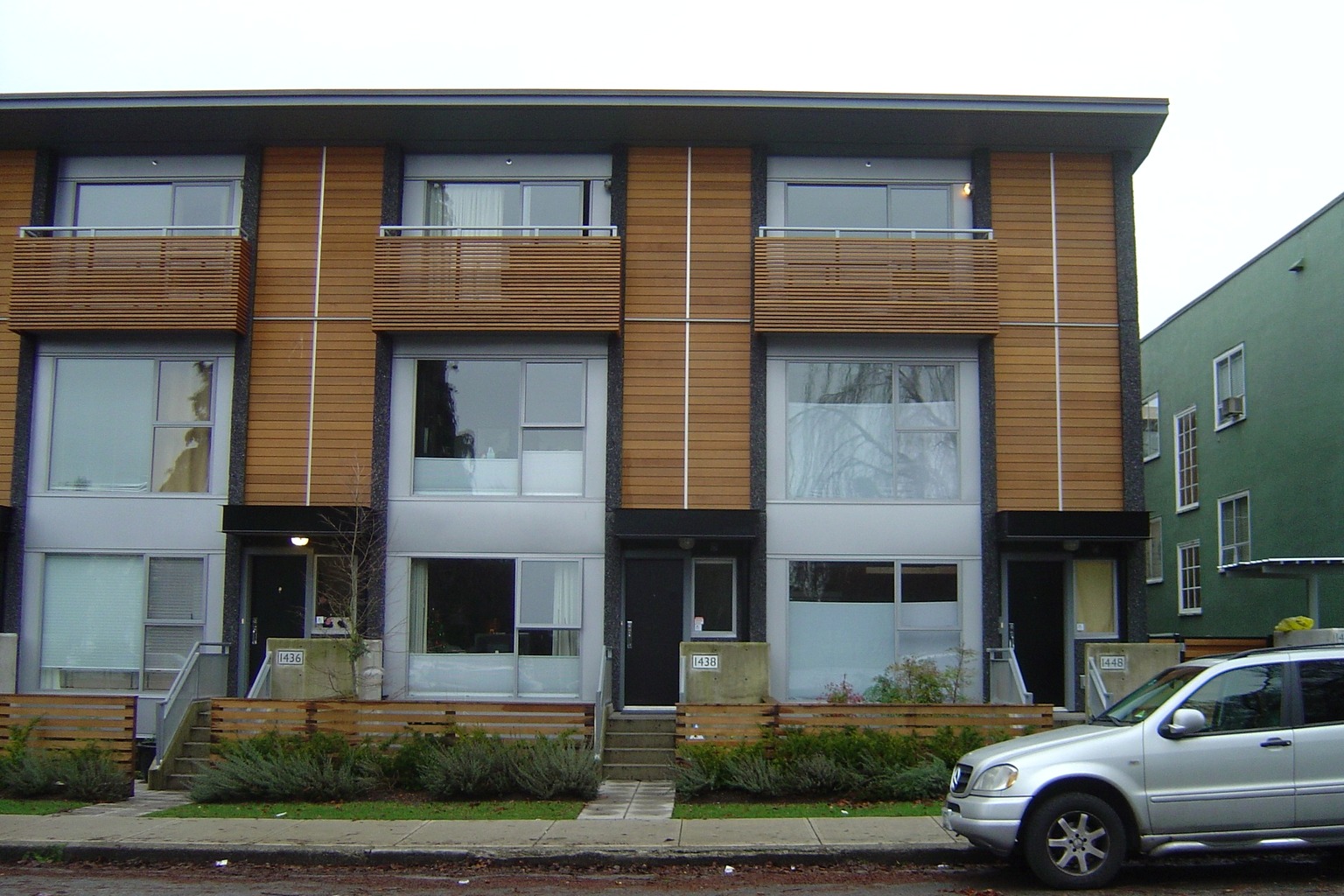 Licensed representative photograph of contemporary British Columbia townhomes; not a specific Penticton property