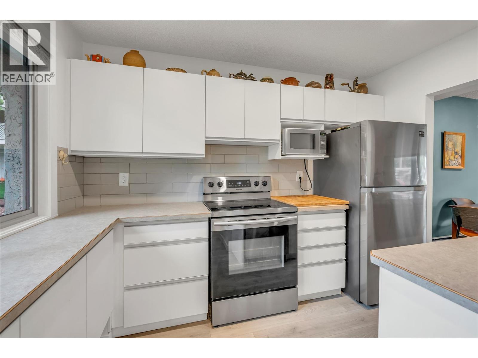 Unit 13 at Skaha Village, 310 Yorkton Avenue, Penticton — renovated kitchen
