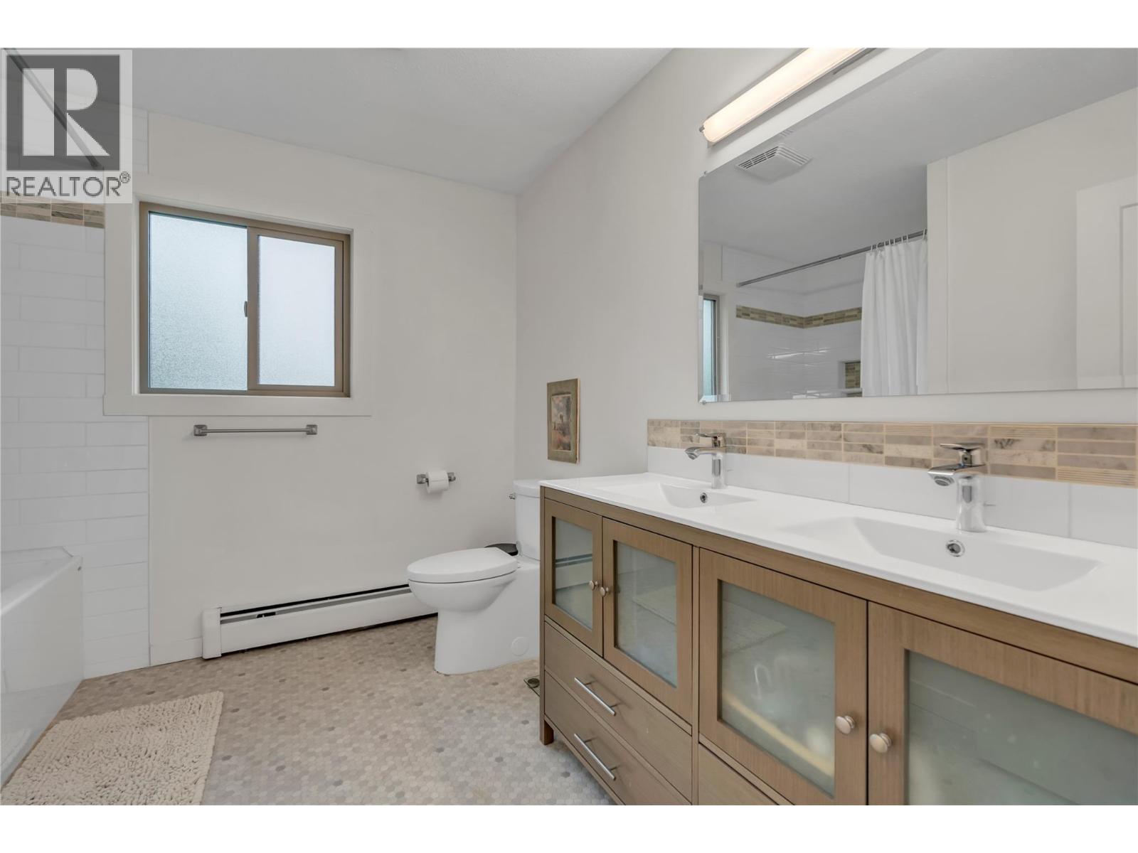 Unit 13 at Skaha Village, 310 Yorkton Avenue, Penticton — updated full bathroom