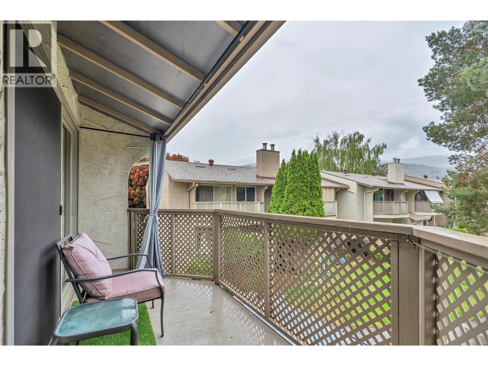 Unit 13 at Skaha Village, 310 Yorkton Avenue, Penticton — private upper balcony