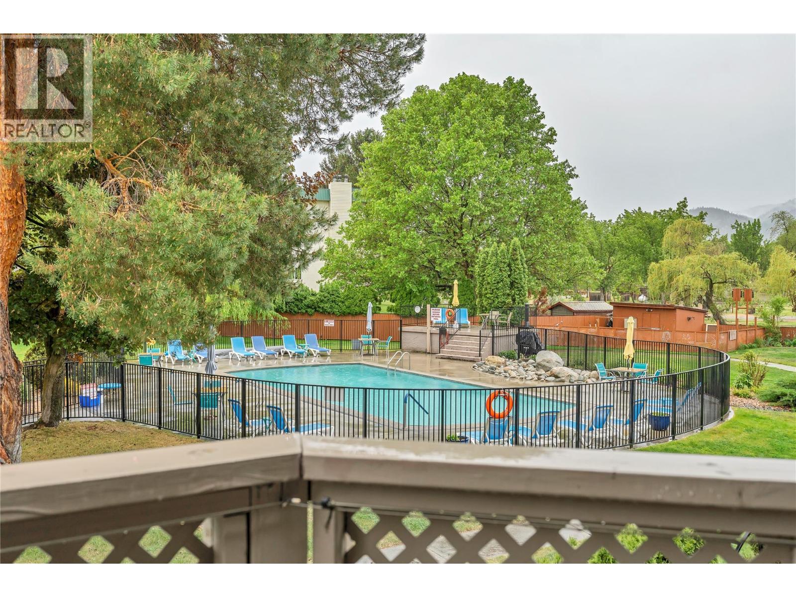 Unit 13 at Skaha Village, 310 Yorkton Avenue, Penticton — shared outdoor pool