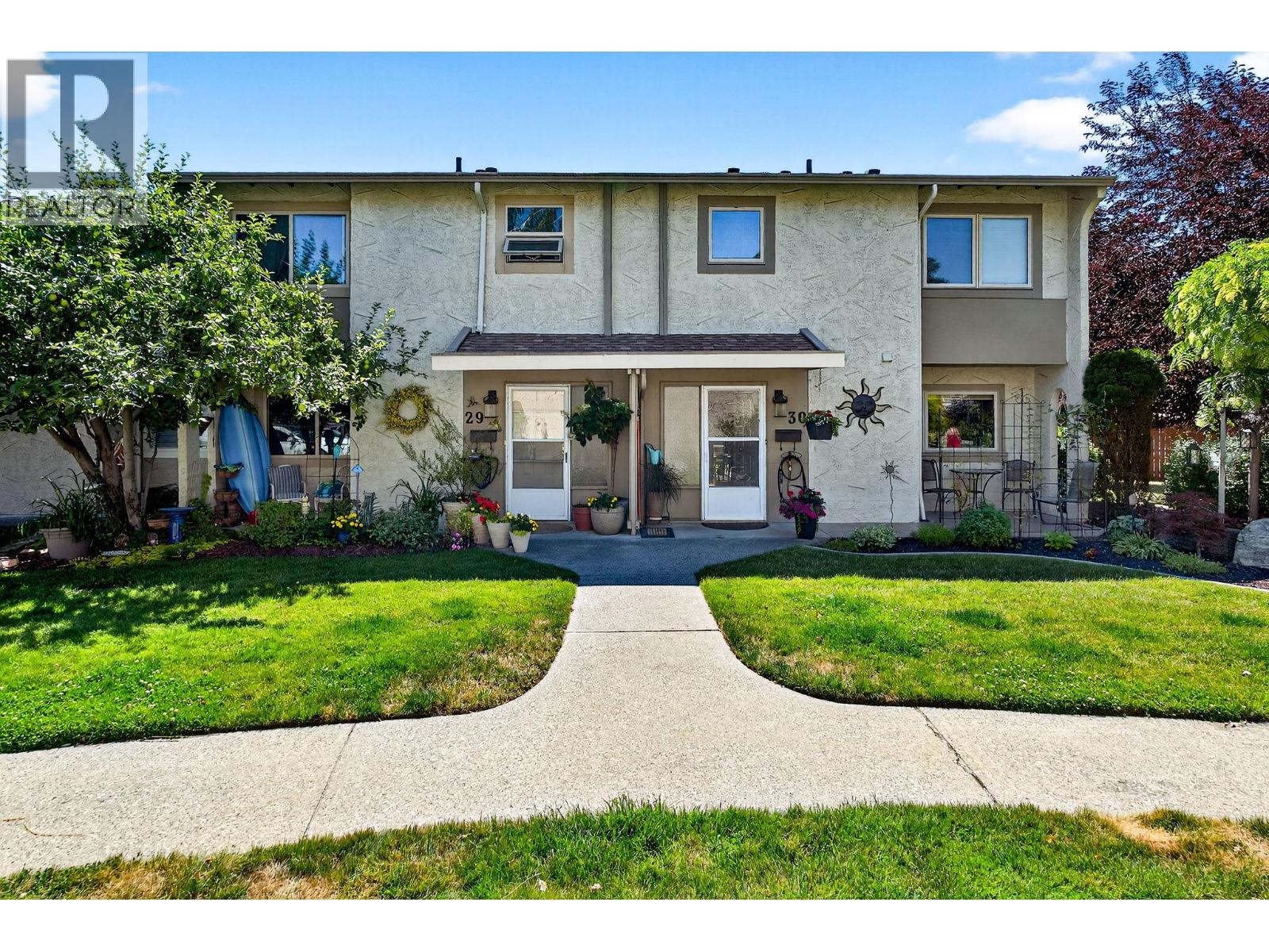 Front exterior of Unit 29 and Skaha Village at 310 Yorkton Avenue, Penticton