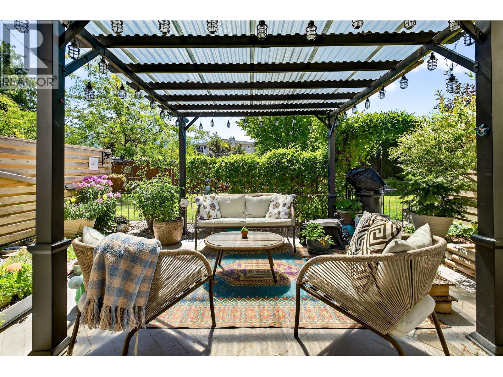 Unit 29 at Skaha Village, 310 Yorkton Avenue, Penticton — private pergola patio