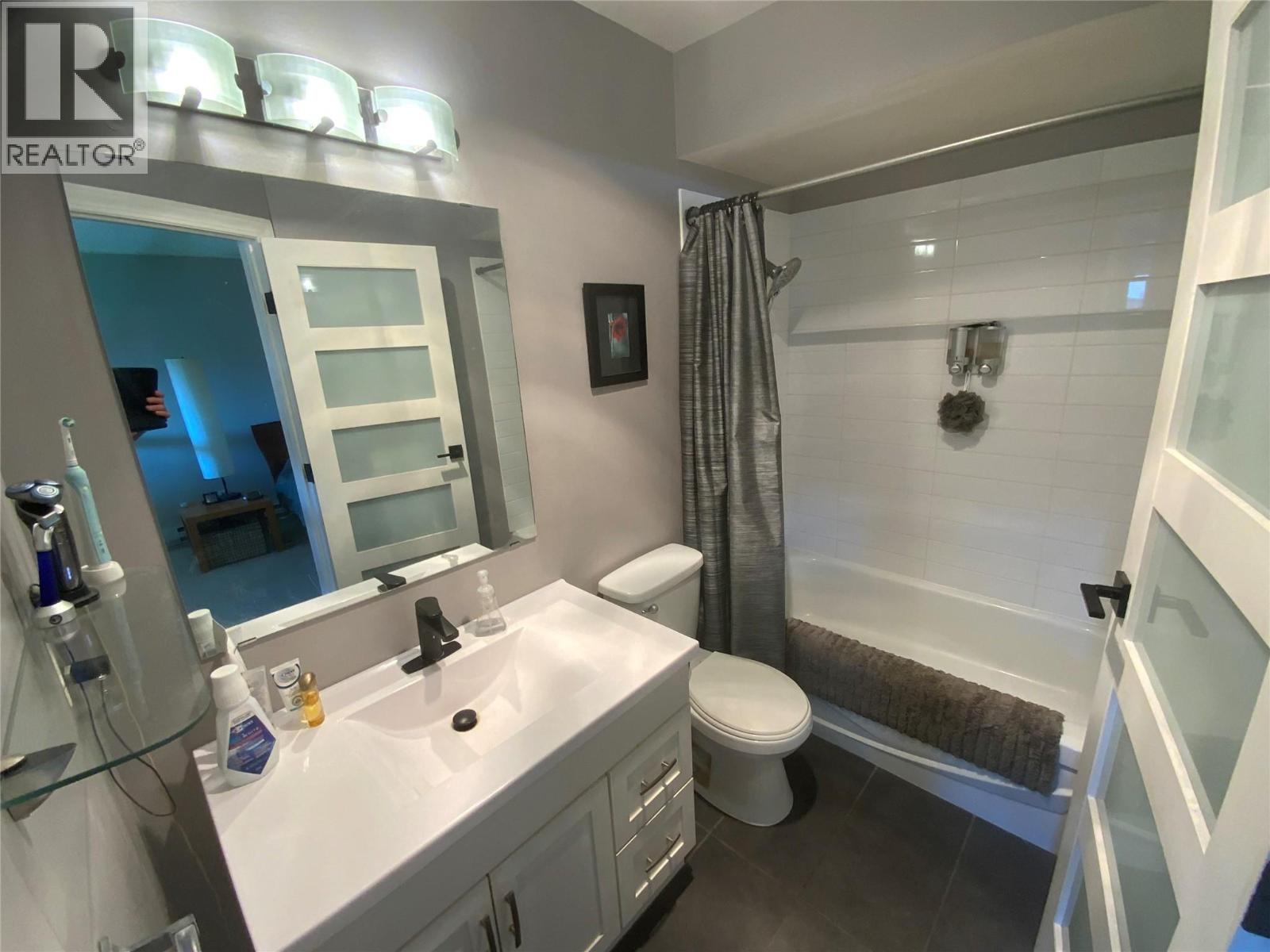 Unit 216 at Tiffany Gardens, 3140 Wilson Street, Penticton — updated full bathroom