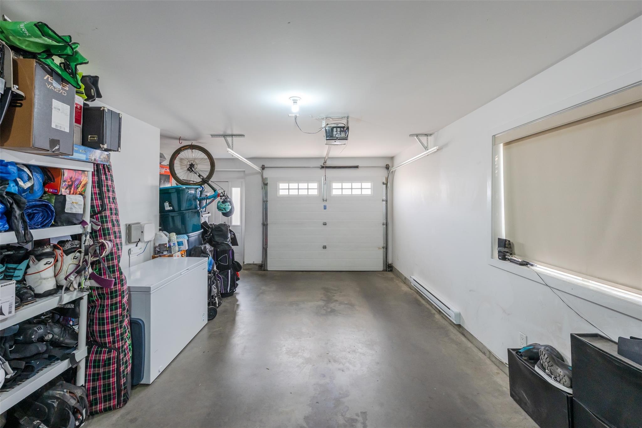 Oversized single garage with storage space in Unit 102.