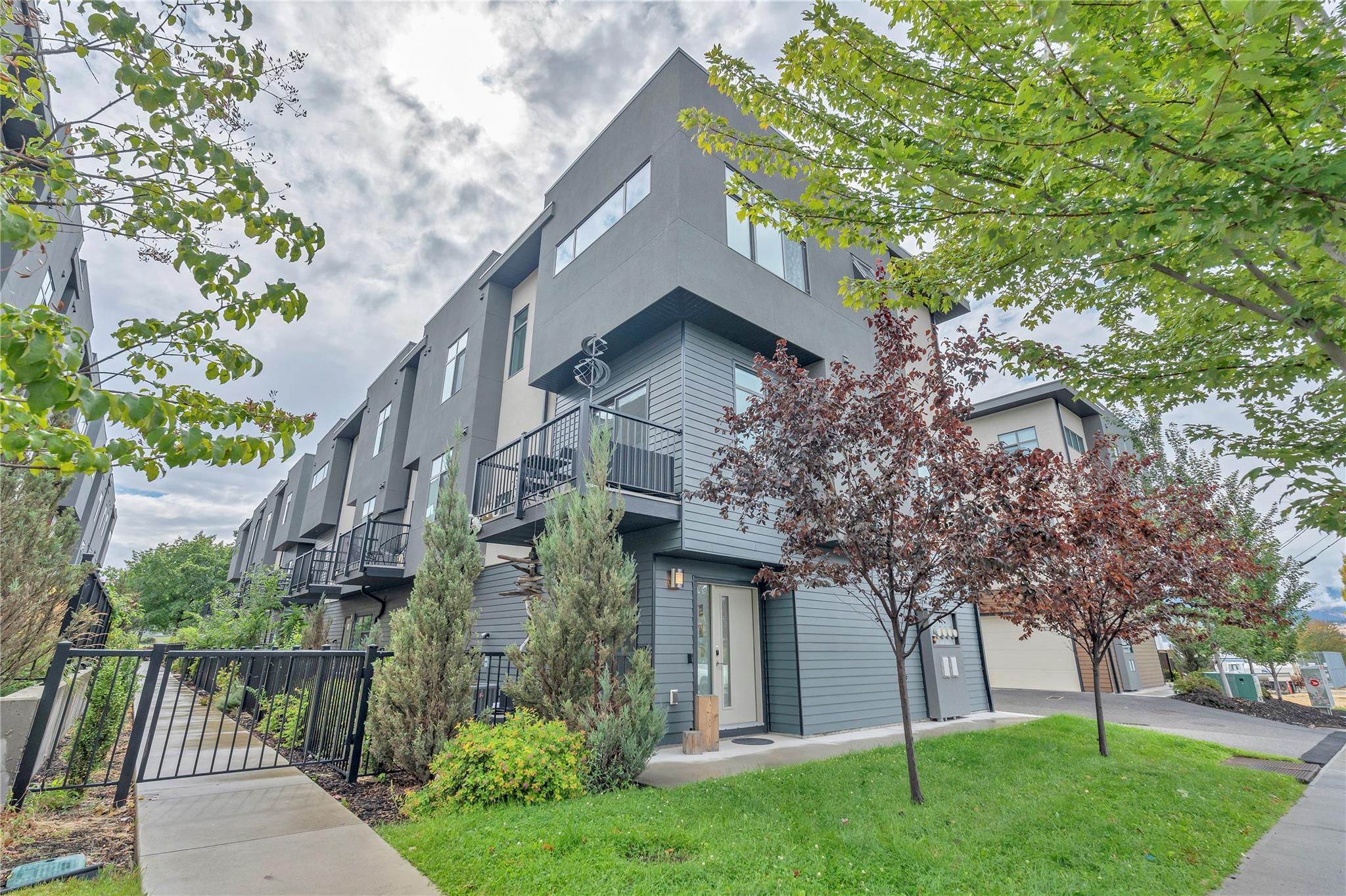 Exterior and landscaped entrance at 115-388 Eckhardt Avenue East in Penticton.