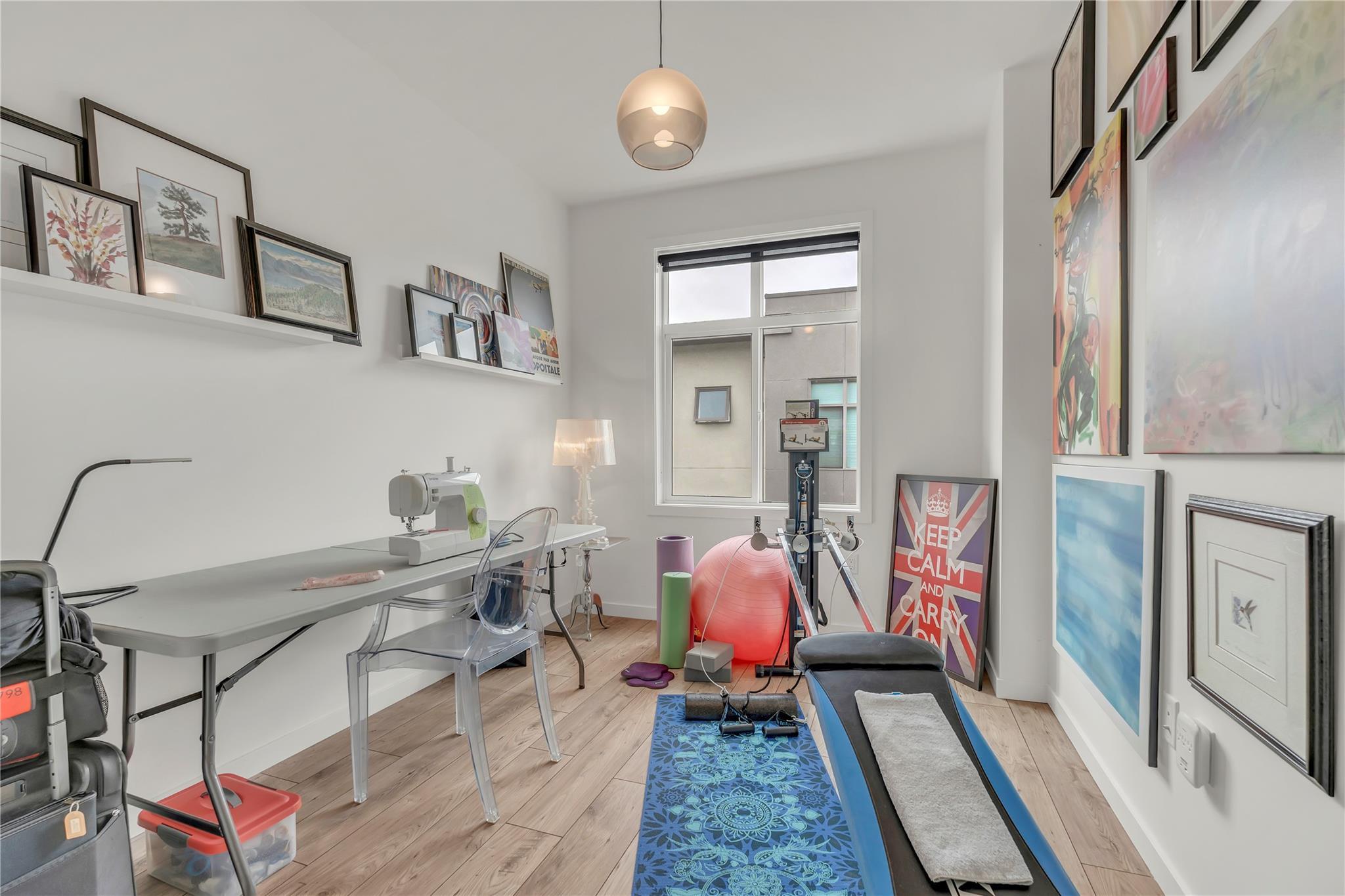 Flexible bedroom or home office in Unit 115.