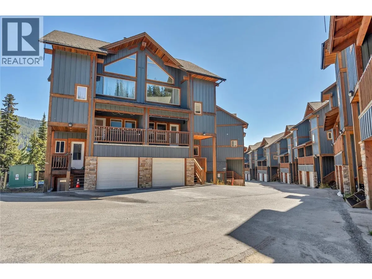 Front exterior of the Snowridge townhome at 14-306 Creekview Road, Apex Mountain.